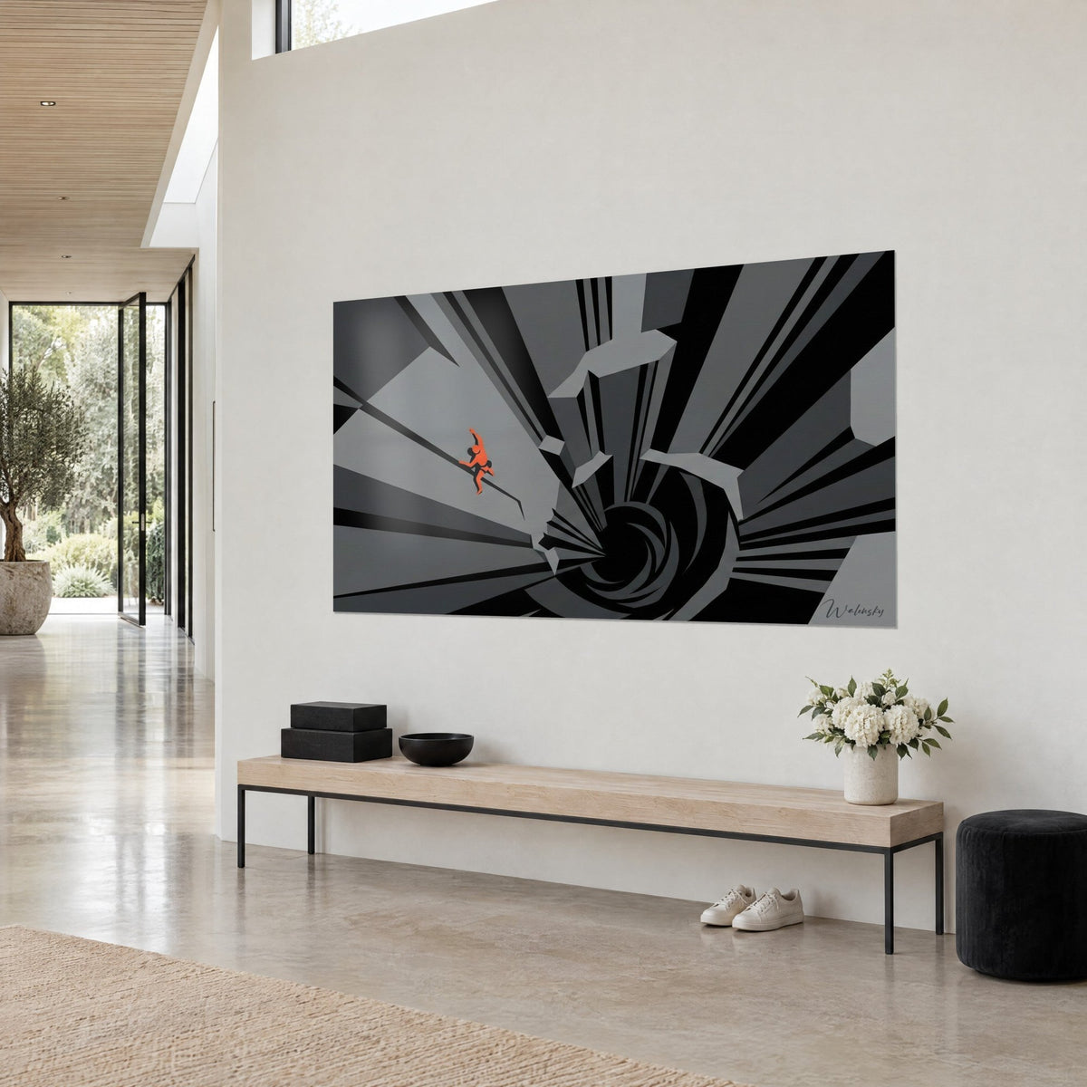Wall art orange-hued mountaineer clinging to a geometric steel-grey cliff, dizzying black spiral, shown at three-quarter view on a white wall