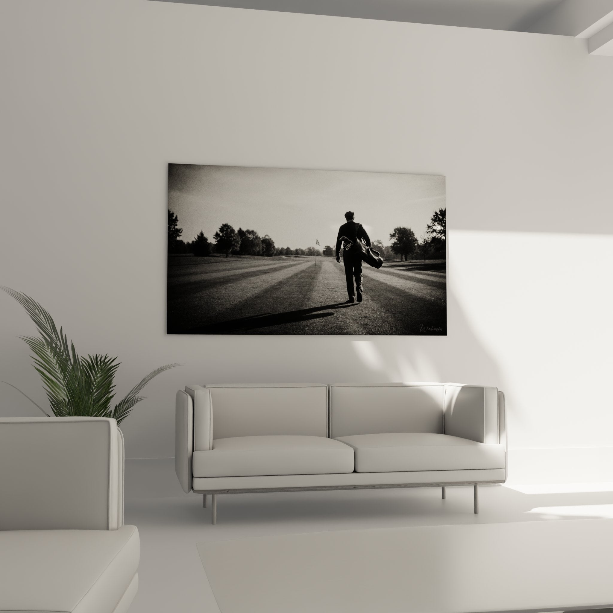 Detail tableau golf artistique - silhouette golfeur sur fairway parfaitement entretenu en noir et blanc