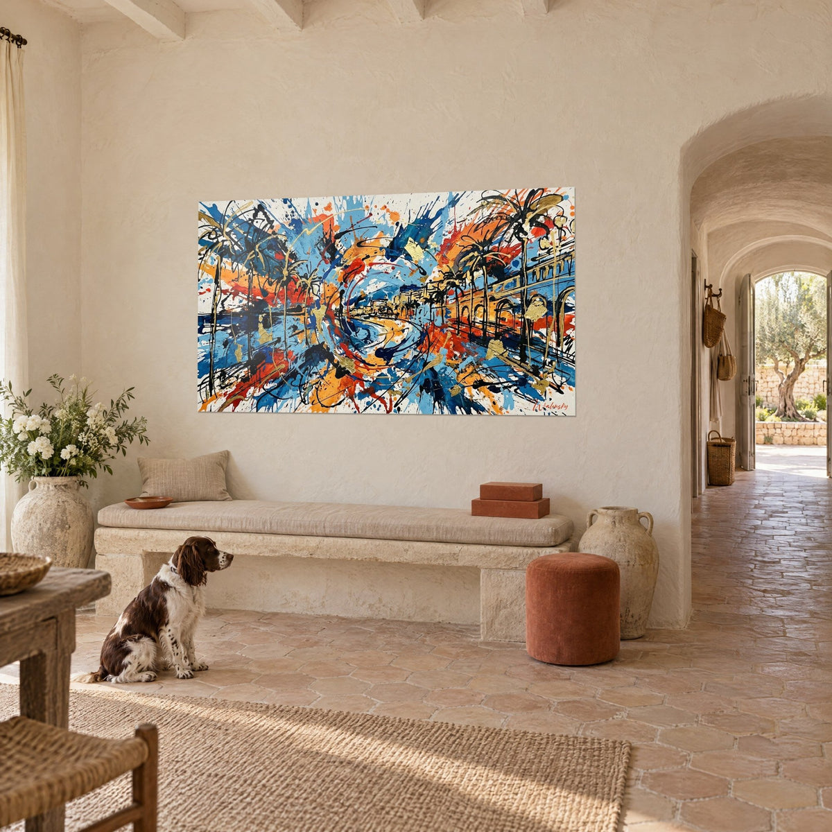 Wall art abstract Baie des Anges in sky blue and vermilion red splashes, with a spaniel sitting in front of the wall of the mas