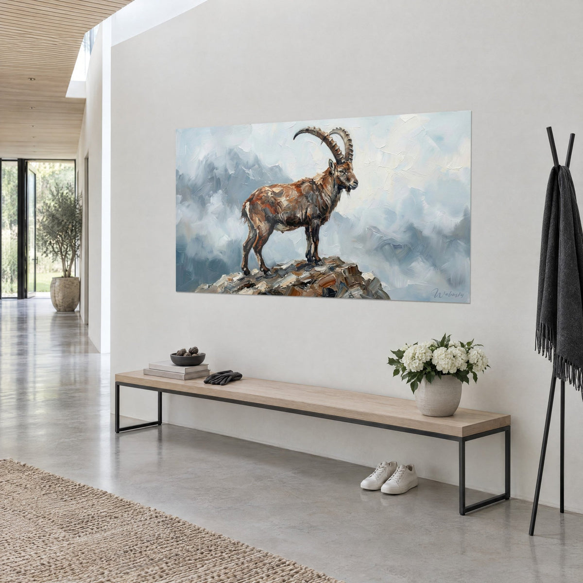 Gemälde alpiner Steinbock auf einem Felsen, kupferfarbenes Fell und hellblaue Wolken, Dreiviertelansicht über einer Holzkonsole
