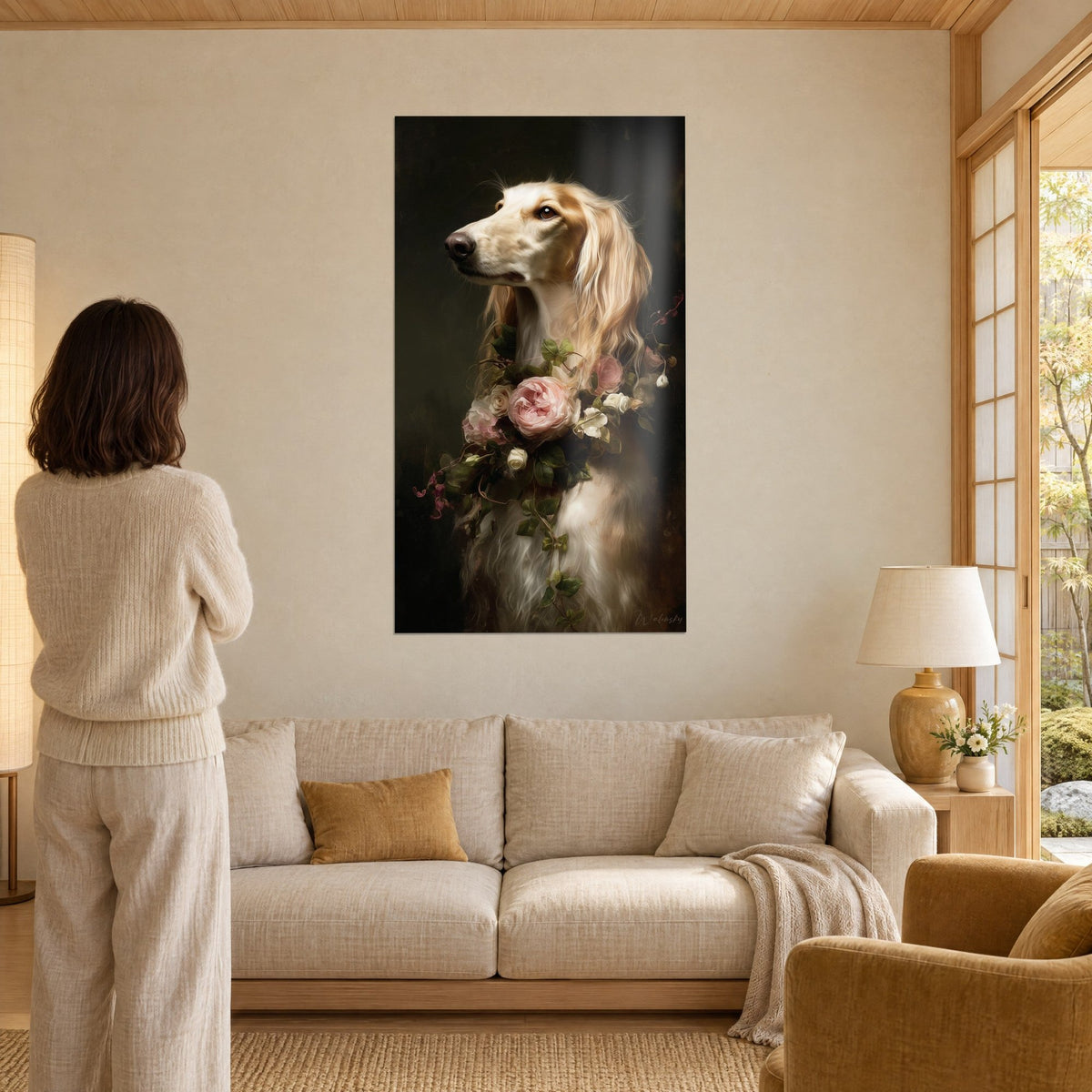Wall art Afghan hound with cream and red fur, necklace of pink roses, woman seen from behind, above a sofa in a bright living room