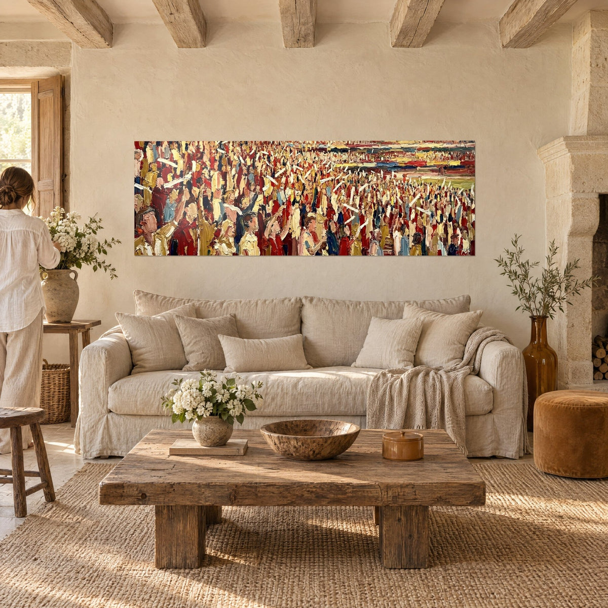Wall art crowd of supporters in full ovation, thick carmine red and ochre paint, above a sofa in a bright living room