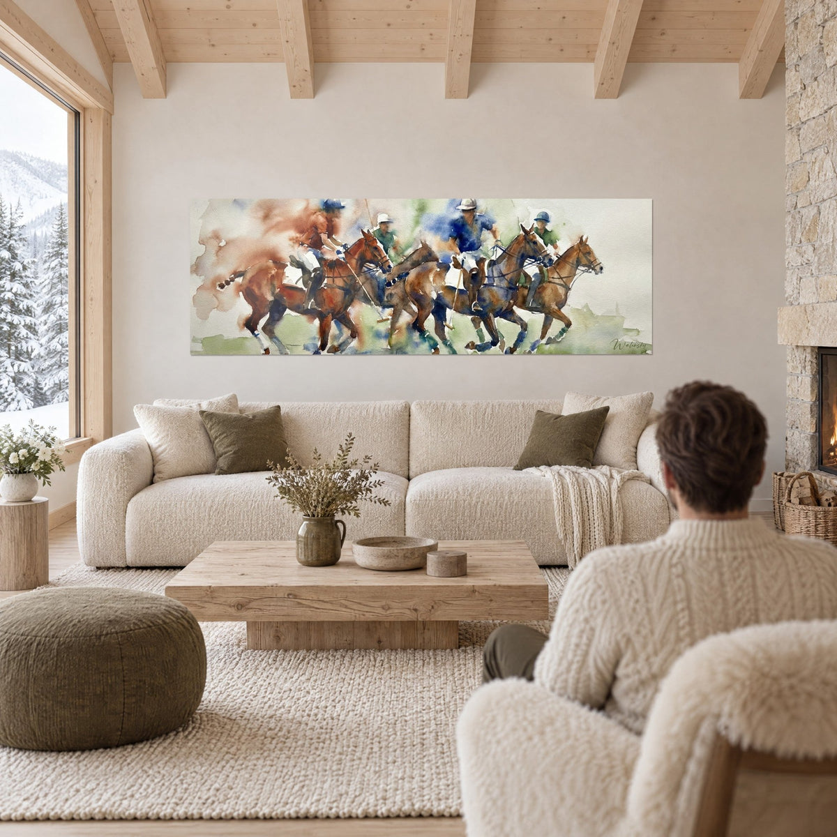 Tableau cavaliers de polo lancés au galop, chevaux alezans et casaques bleu roi, au-dessus d'un canapé dans un salon lumineux