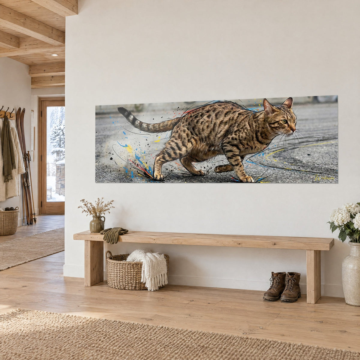 Wall art of an Ocicat in full stride, golden brown spotted coat, black ink strokes and blue accents, on a white chalet wall