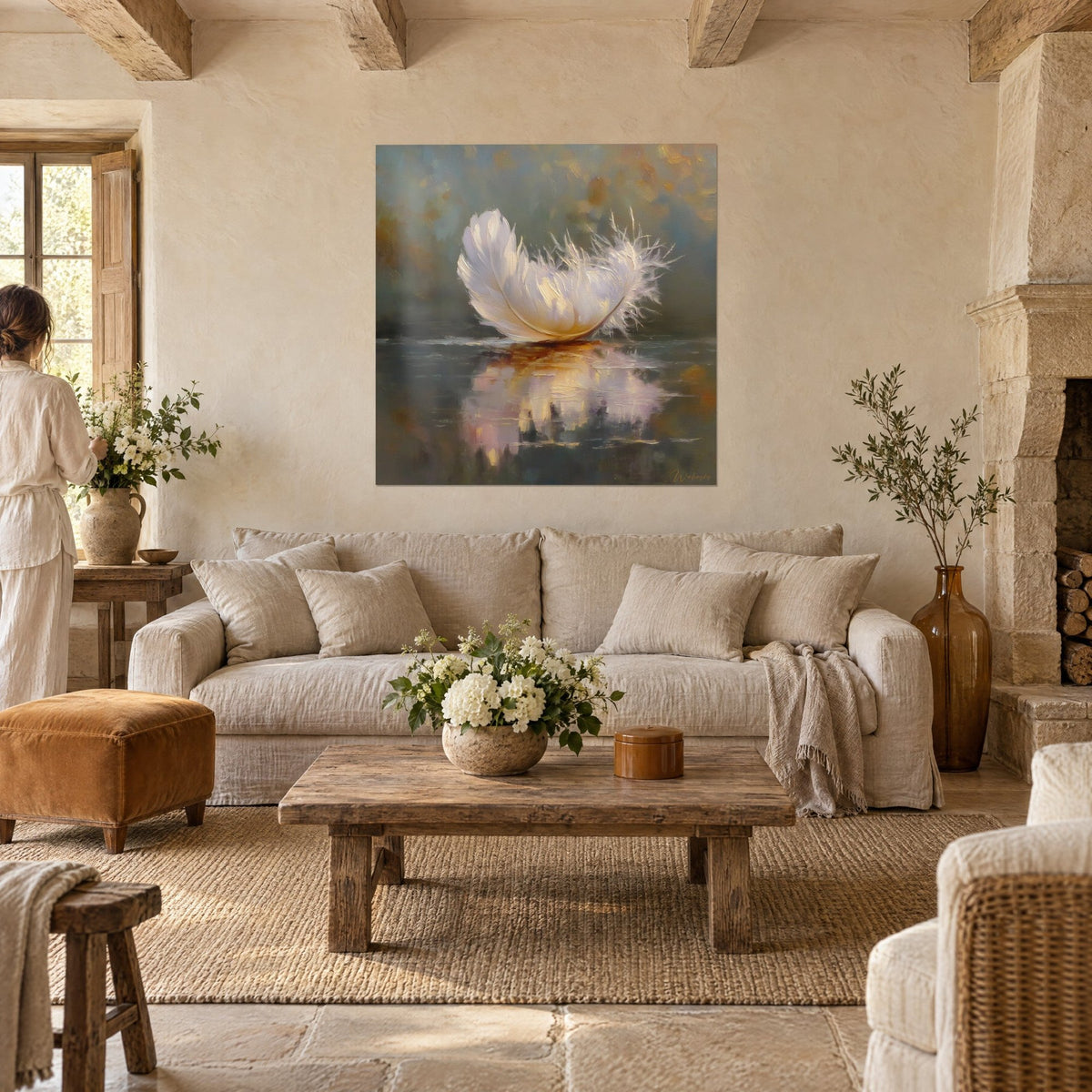Wall art white feather floating on dark water, golden and pink reflections, two people seen from behind, above a sofa in a bright living room