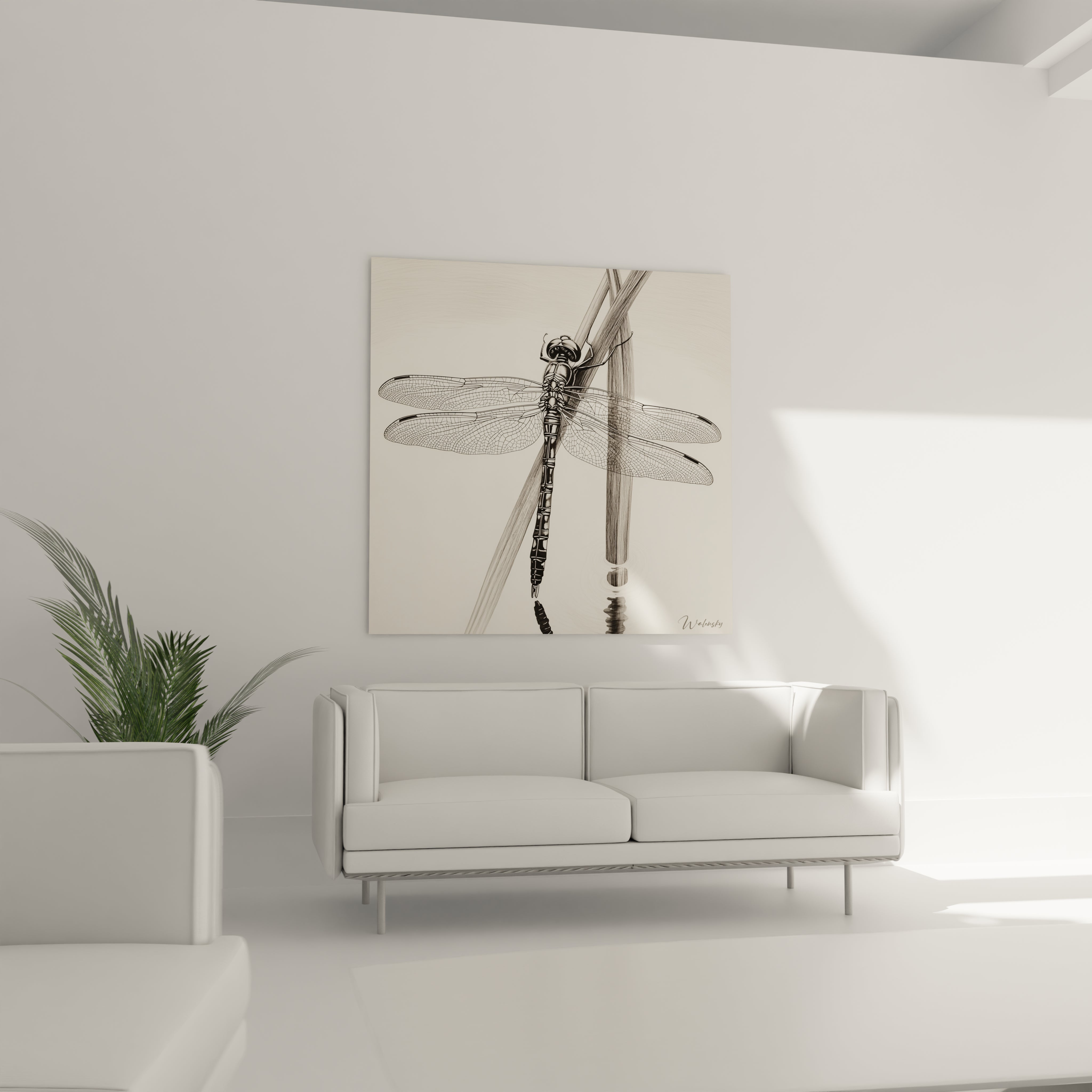 Tableau libellule de Walensky dans un salon minimaliste avec canapé blanc et plante verte