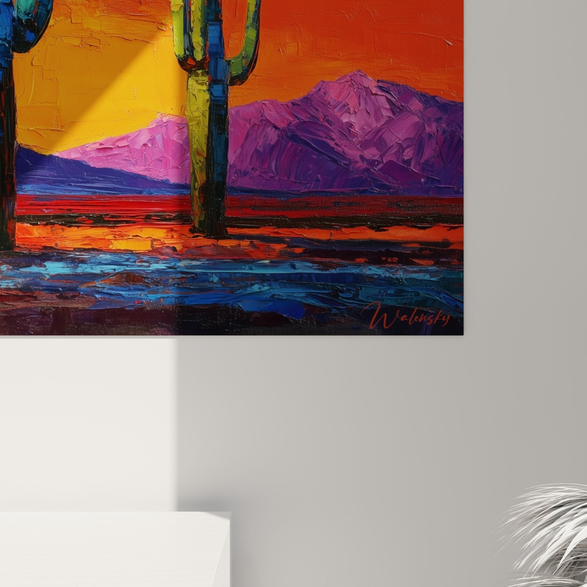 Salon contemporain décoration murale tableau cactus désert coucher soleil couleurs chaudes ambiance moderne