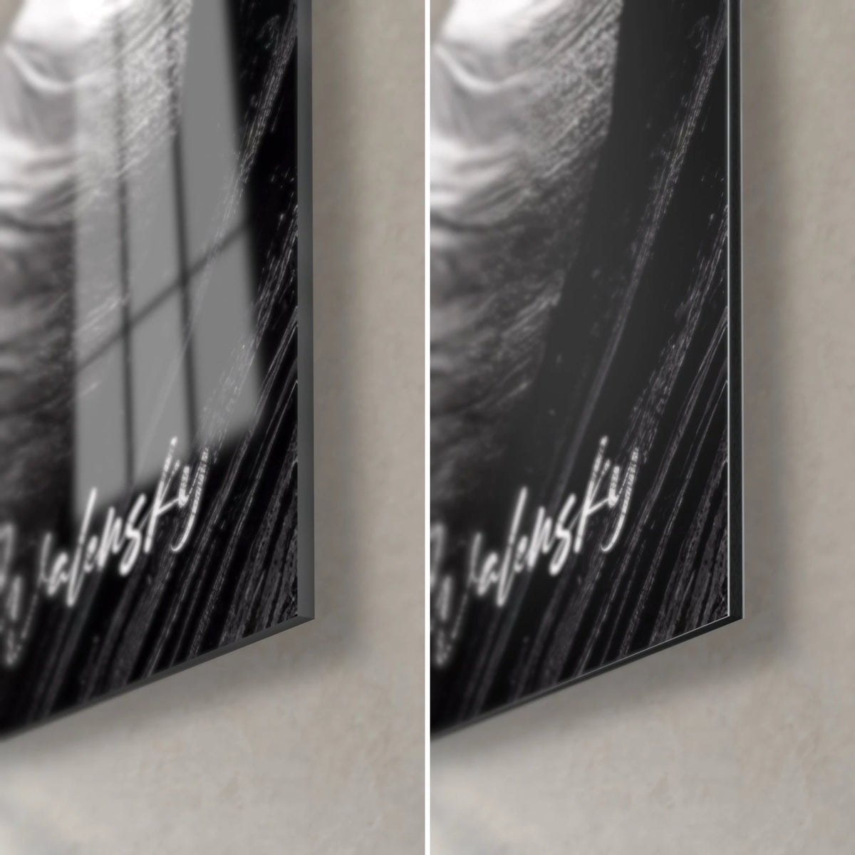 Wall art of massive granite needles, white Walensky signature, glossy glass reflecting the window and matte black Dibond