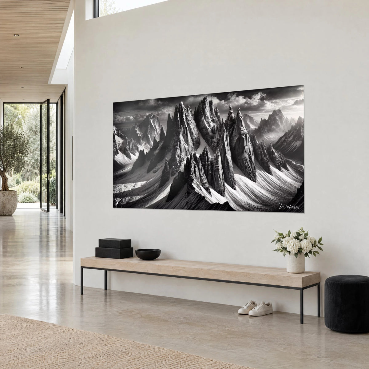 Wall art streaked rocky needles, charcoal grey and snowy white, fan-shaped glaciers, on a light living room wall
