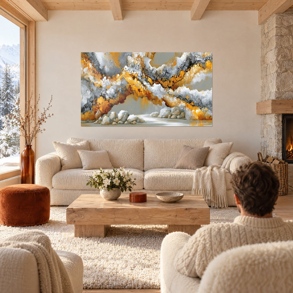 Tableau arche minérale dorée et anthracite aux cellules ocre, deux gris cendrés, rochers blancs, au-dessus d'un canapé dans un salon lumineux