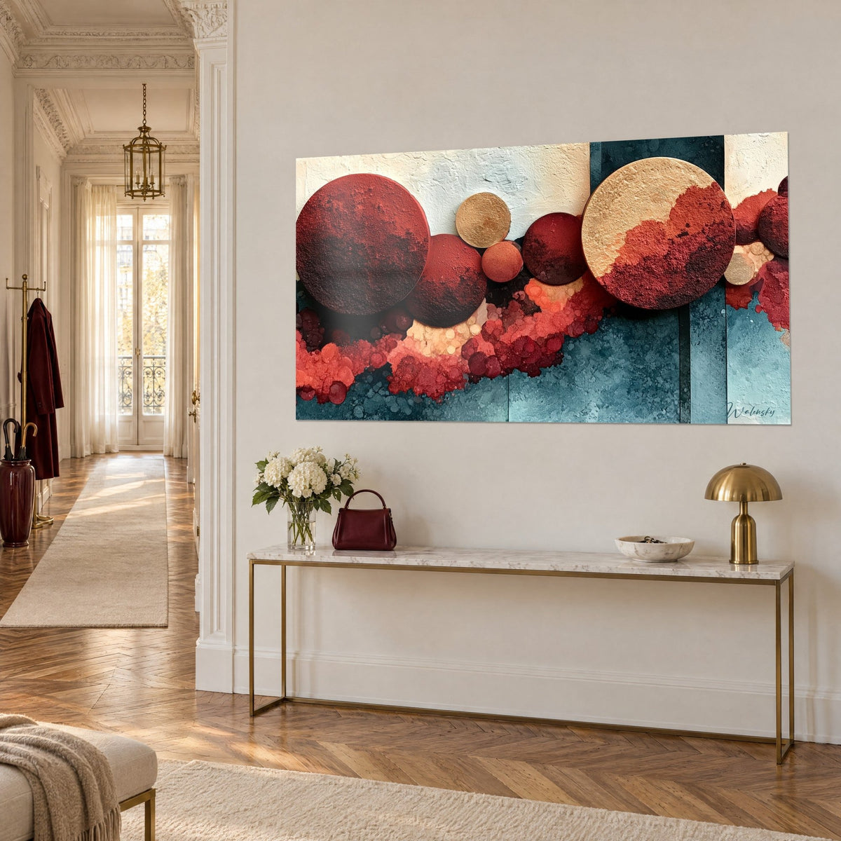 Wall art circles of brick red and gold pigments on a turquoise background, hung high above a gilded console