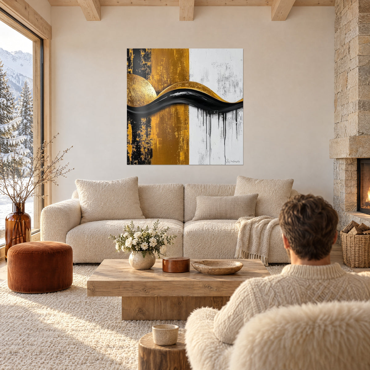 Wall art black lacquered wave flowing over gold and white background, person seen from behind, above a sofa in a bright living room