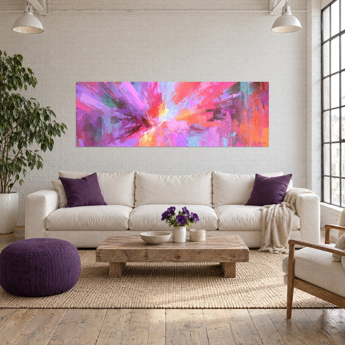 Wall art explosion of pink and purple with a glowing yellow core, converging white rays, above a sofa in a bright living room