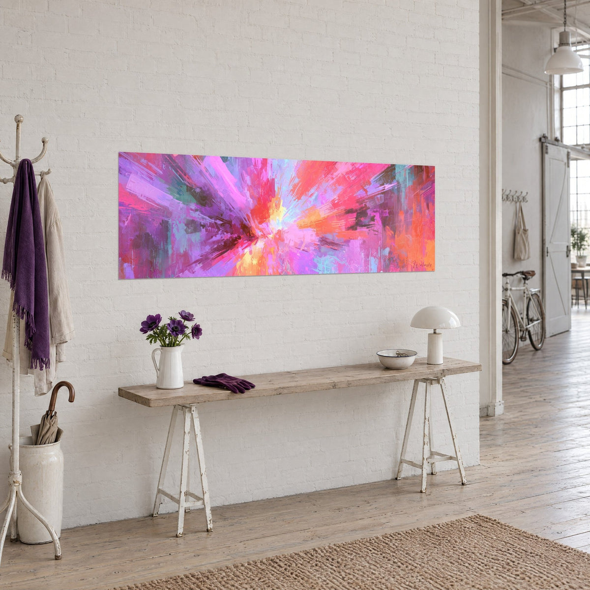 Wall art burst of fuchsia and orange brushstrokes erupting from a golden centre, panoramic, artist loft with white walls