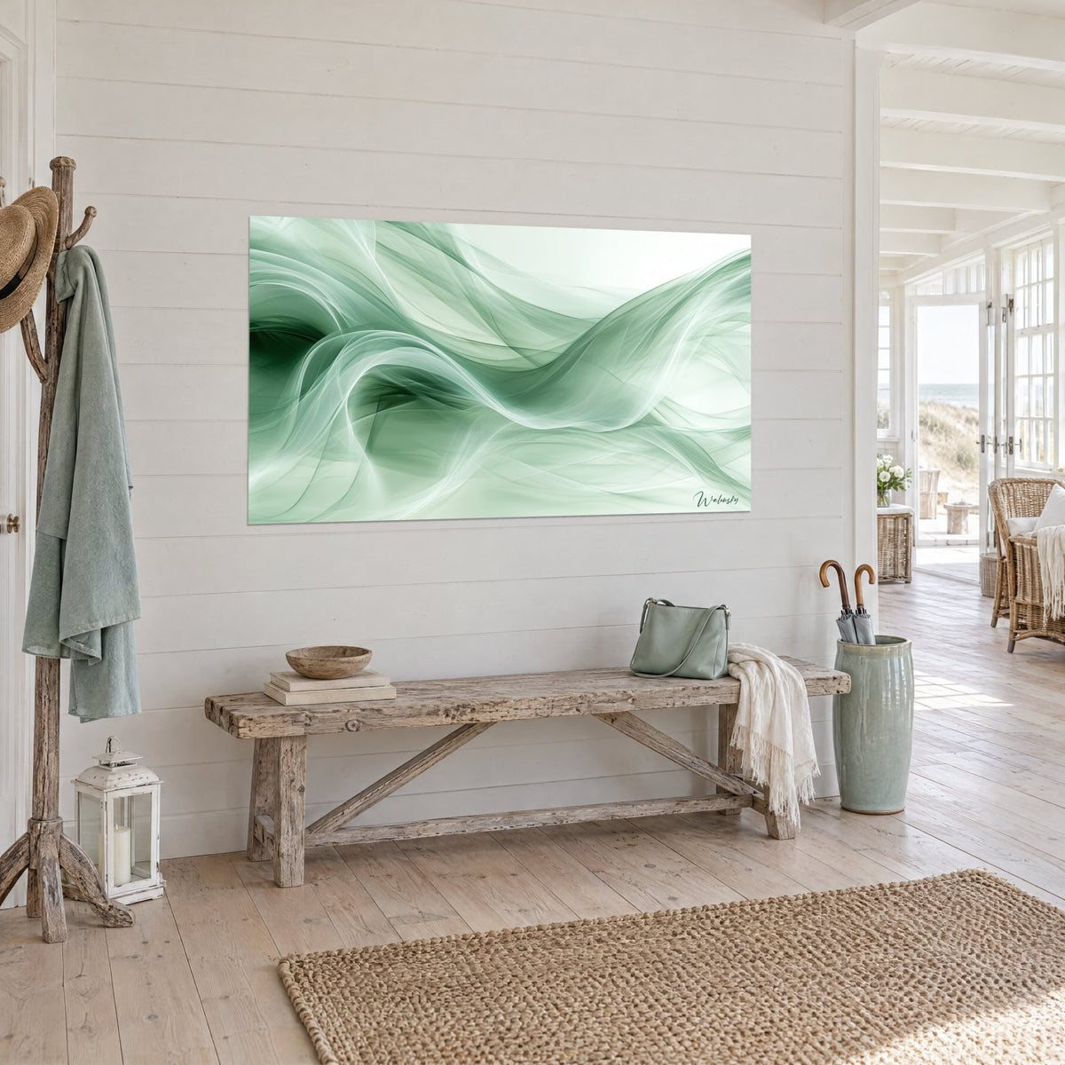 Tableau ondulations de soie vert menthe et blanc nacré, accroché près d'une banquette en bois, vue de trois-quarts, maison de plage