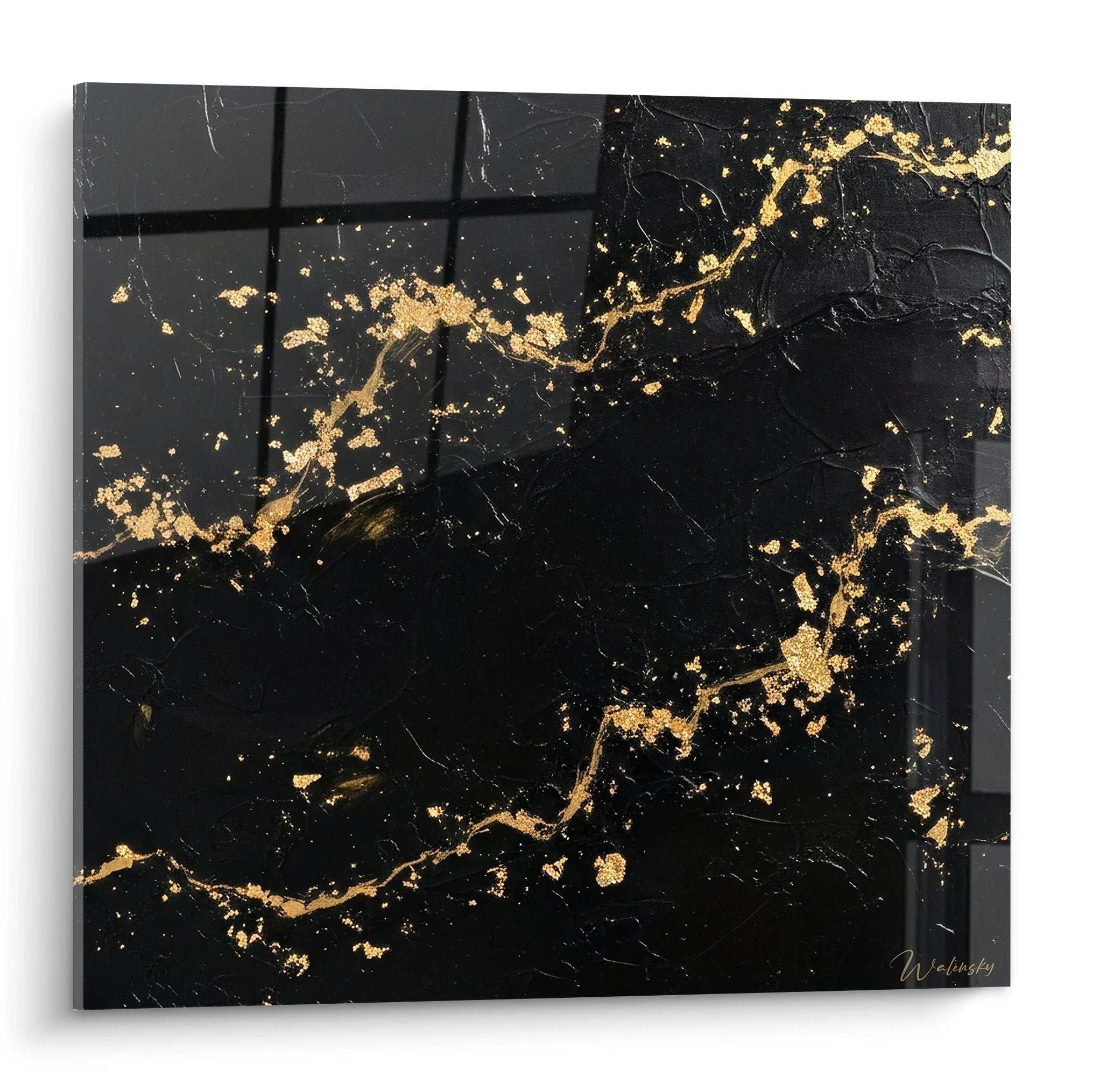 Tableau abstrait noir et or avec éclaboussures dorées et texture craquelée style japandi