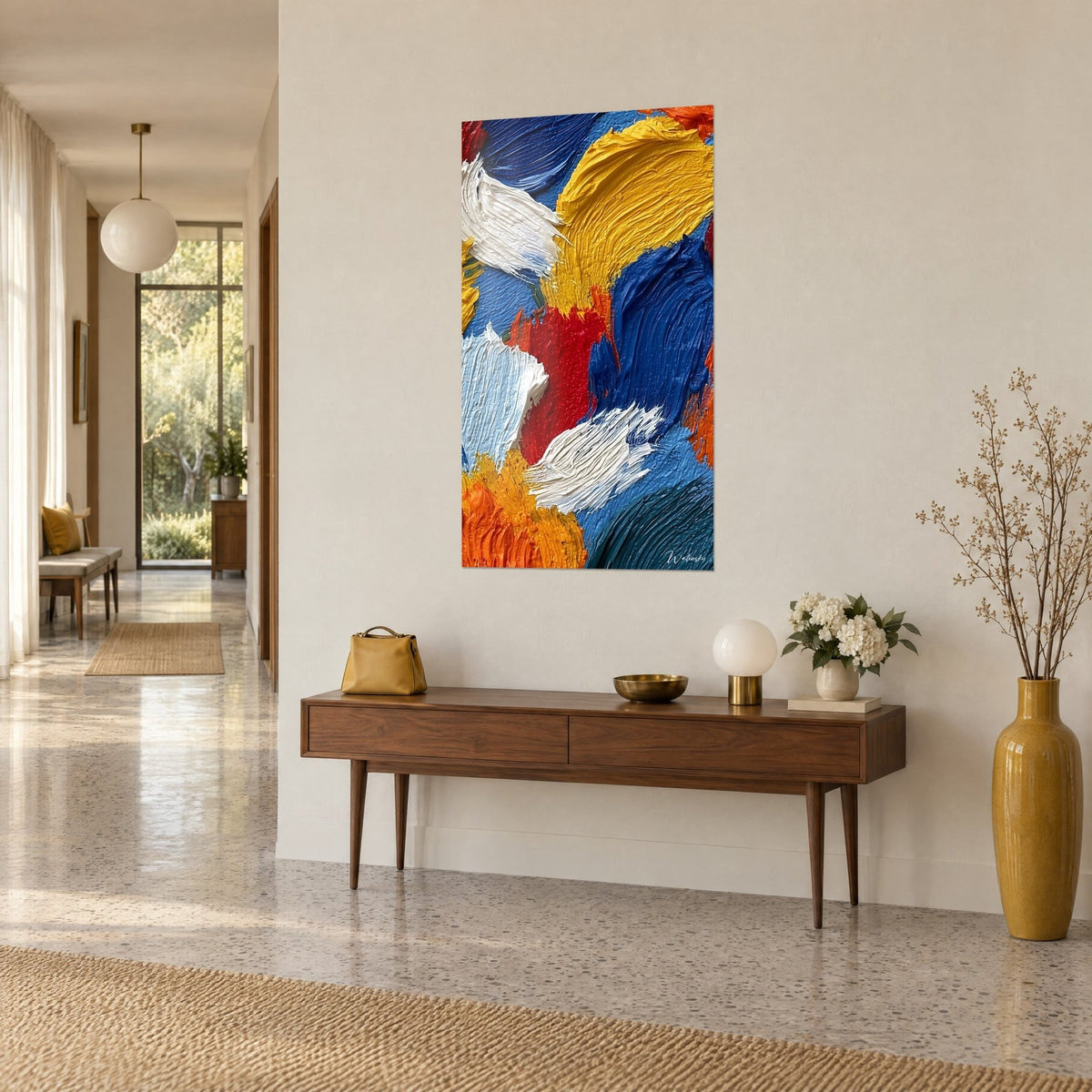 Wall art abstract painting with generous paint in royal blue, golden yellow and creamy white, above a wooden console, bright hallway