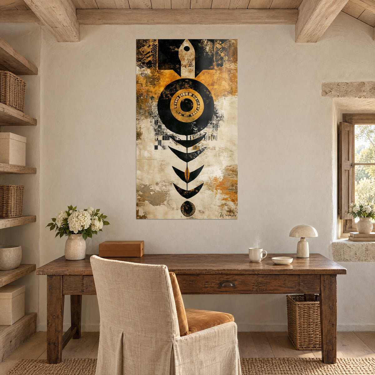 Wall art abstract black, gold and cream emblem, arrow at the top, cascading black leaves, on the wall of an old wooden study