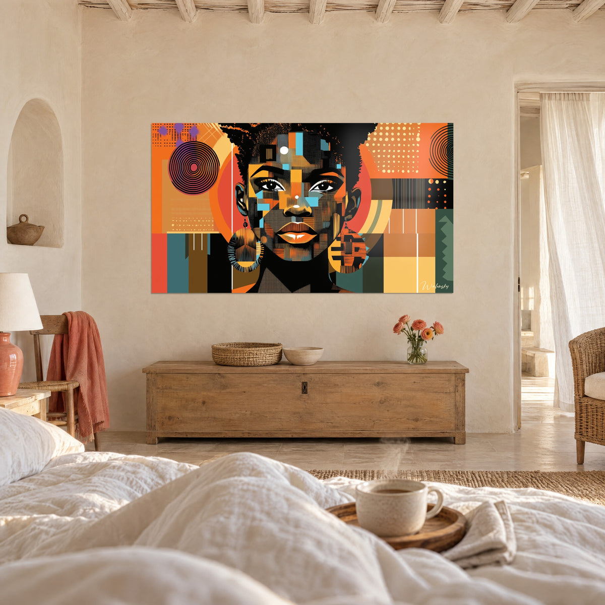 Cuadro modelo africana en píxeles azul cielo y naranja, mirada frontal, sobre una cama en un dormitorio luminoso
