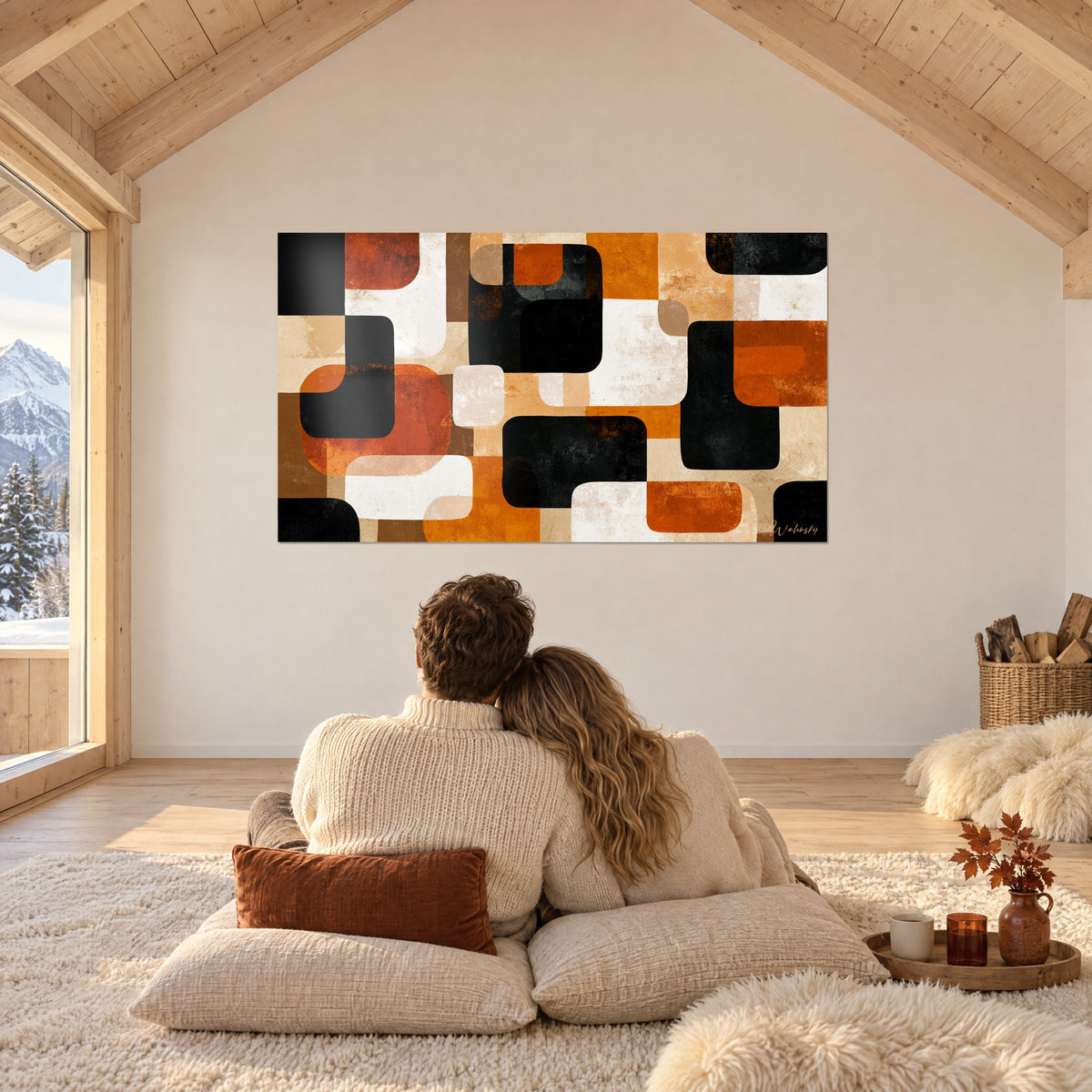 Tableau kaléidoscope de rectangles souples noirs, cuivre et blanc cassé, un couple de dos sur des coussins, chalet