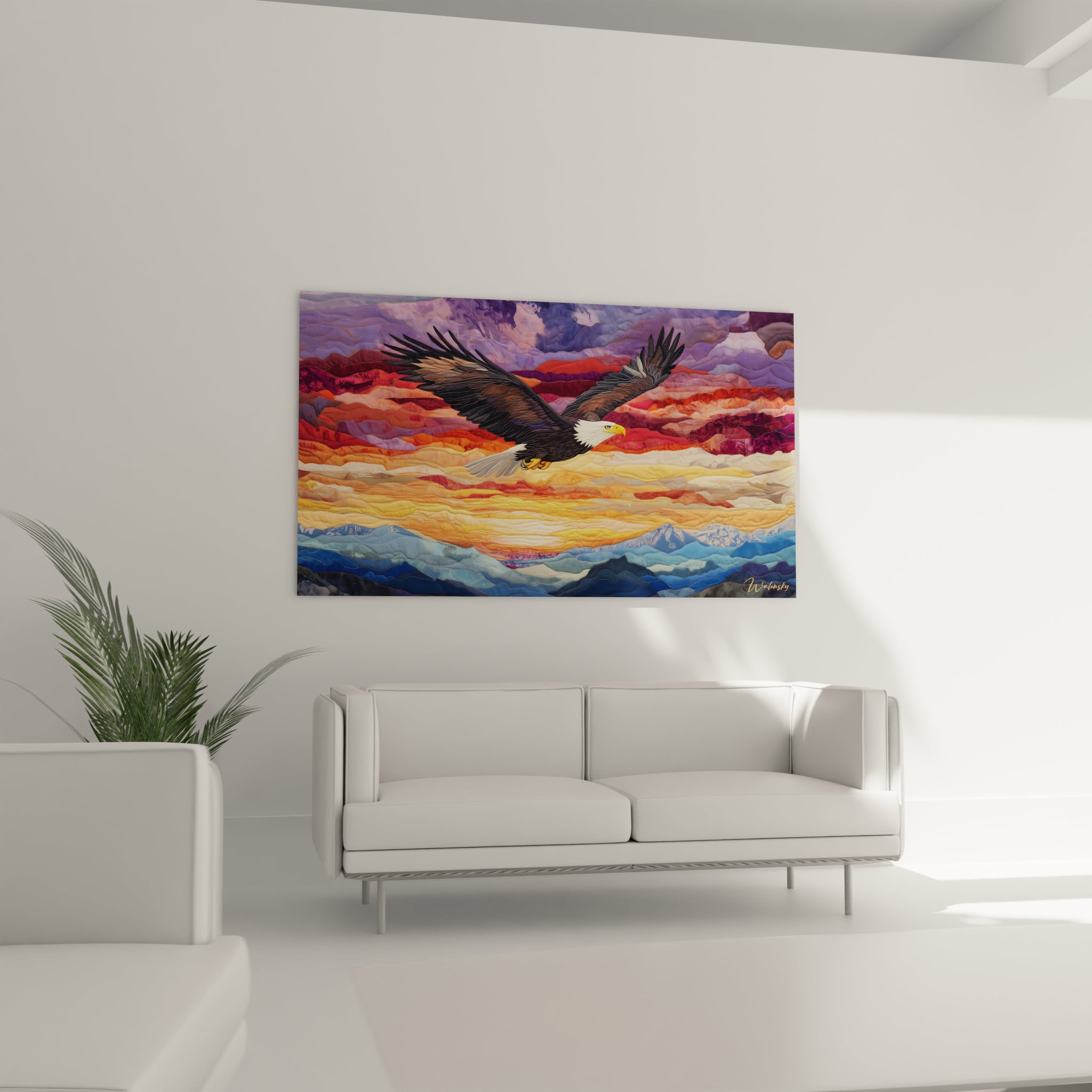 Un tableau textile présentant un aigle américain en vol, détaillé avec précision, surplombant un paysage abstrait composé de couches ondulantes dans des dégradés de bleu, orange, rouge et pourpre, créant une impression de mouvement et de profondeur.

