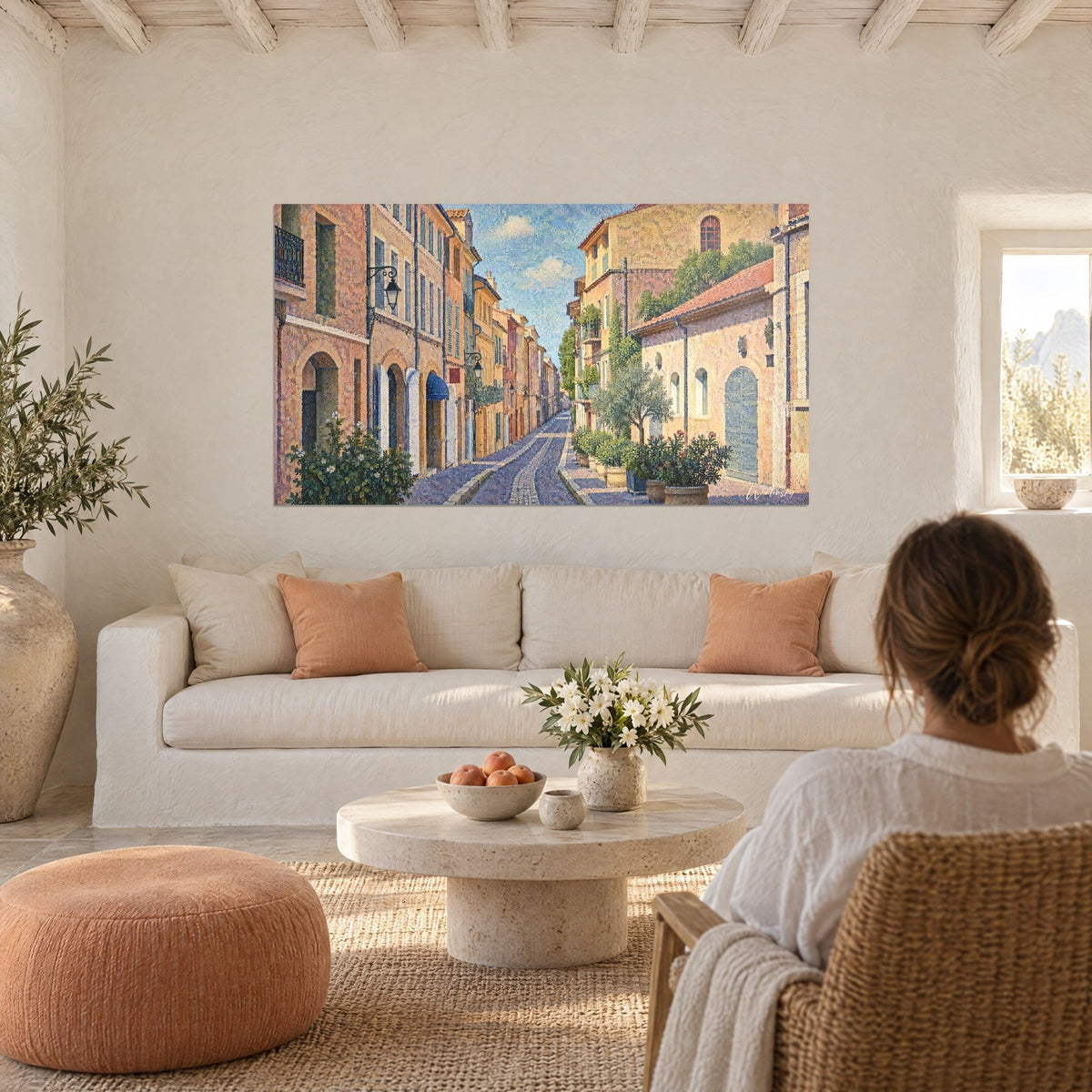 Wall art cobblestone alley with ochre facades and Provençal blue shutters, pointillist touches, above a sofa in a bright living room