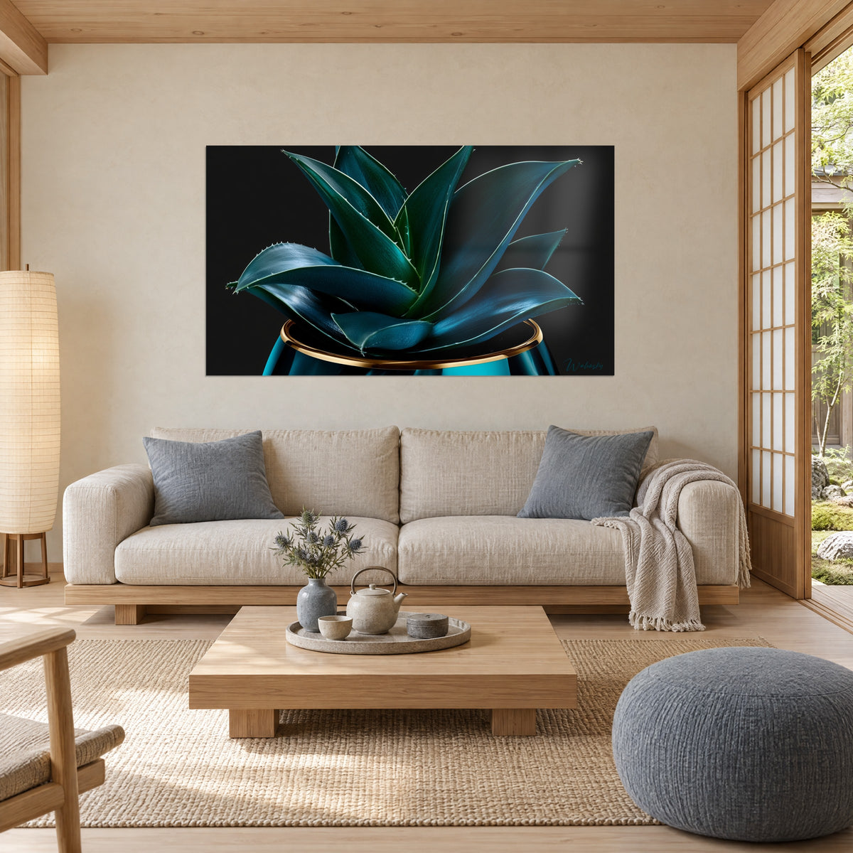 Wall art petrol-blue aloe in a gold pot, fleshy spiky leaves on black background, above a sofa in a bright living room