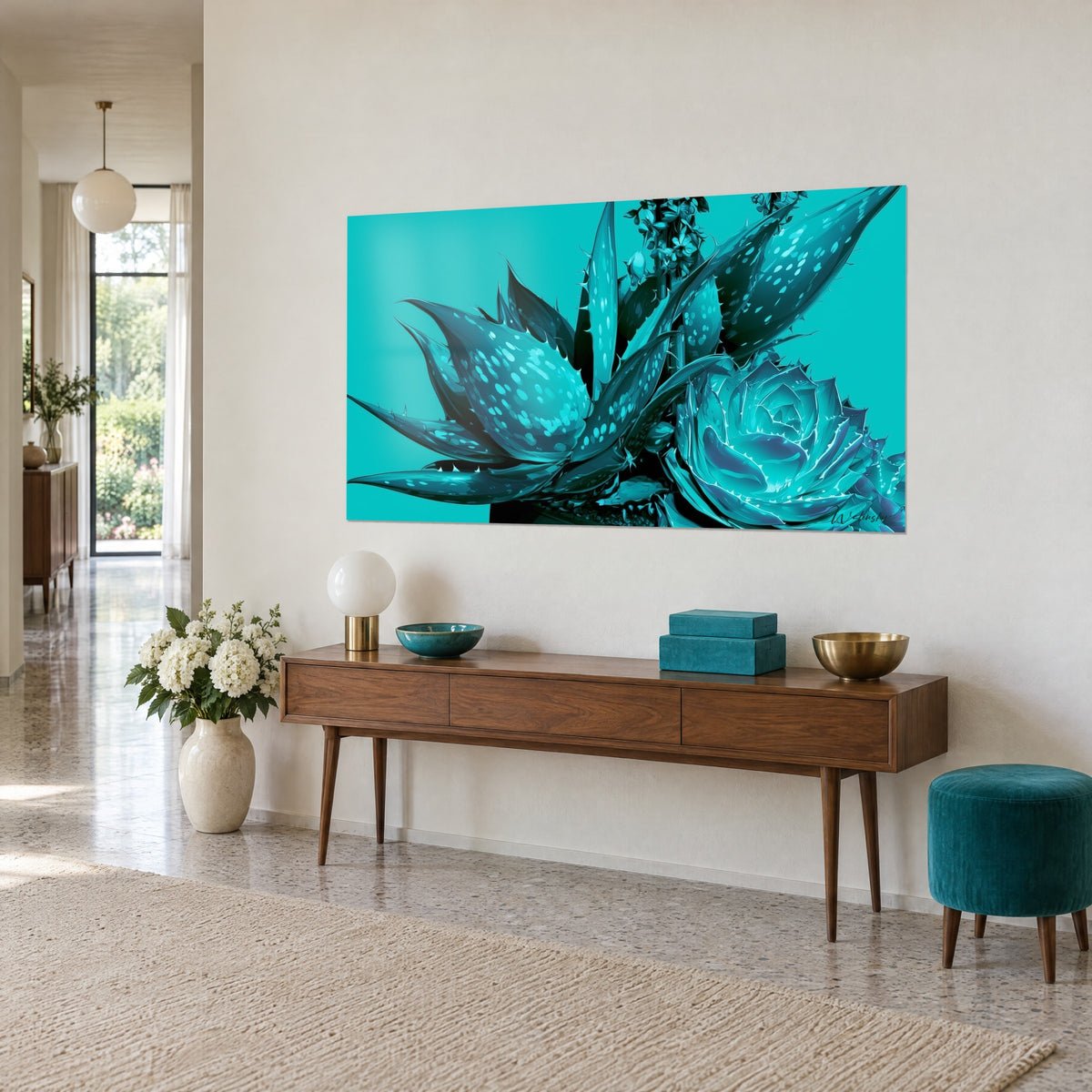 Wall art succulent in a petrol-blue rosette on a vivid cyan background, pointed leaves dotted with pale spots, hung above a wooden console