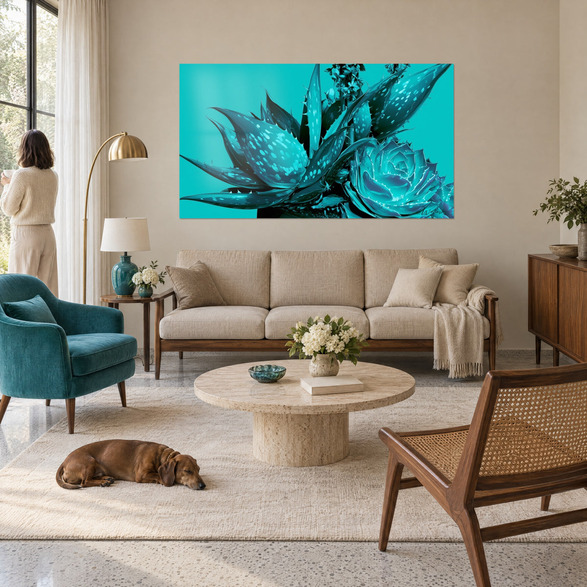Wall art turquoise aloe with pale-speckled leaves and white spines, cyan background, above a sofa in a bright living room