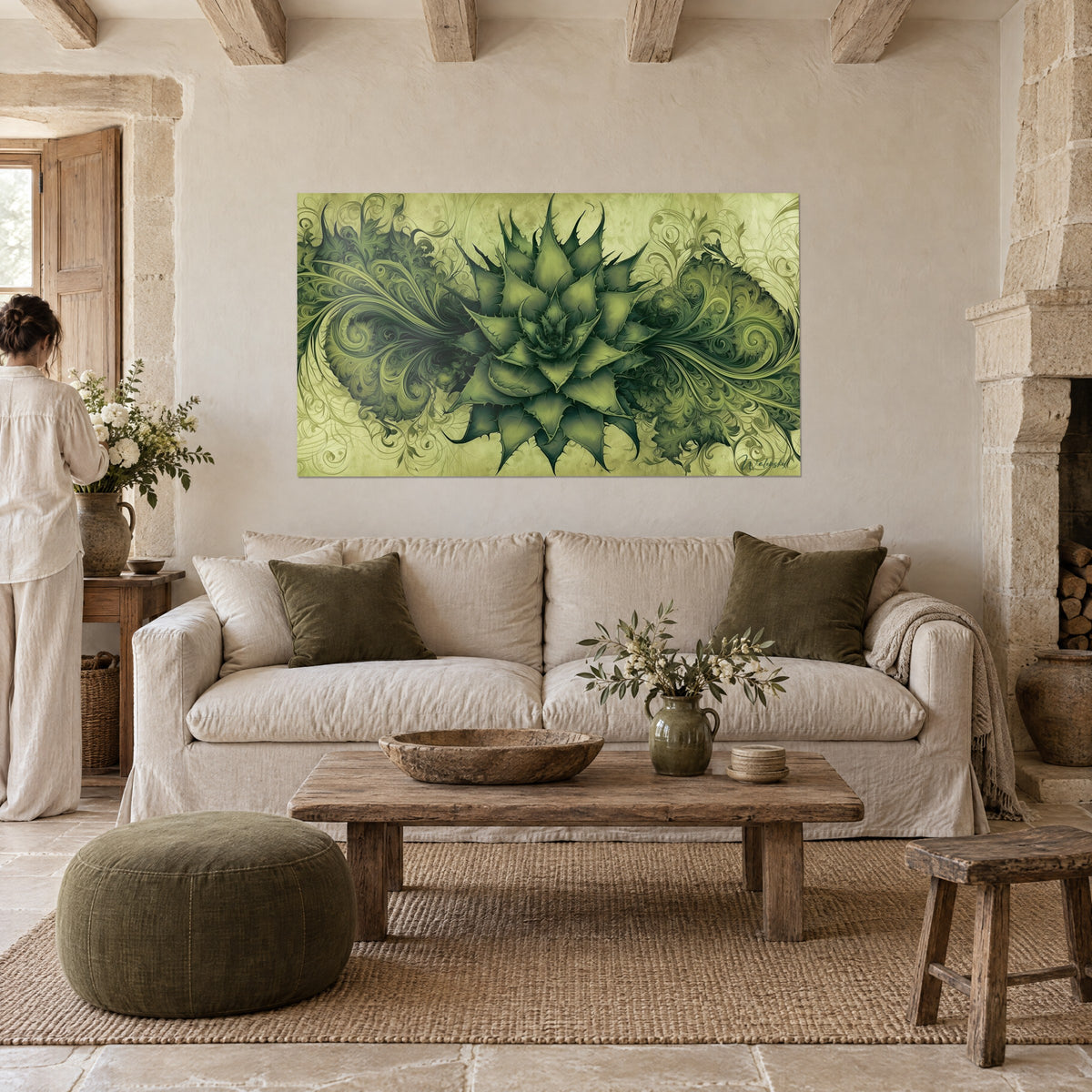 Tableau aloe vera olive en rosace épineuse, volutes vert mousse, au-dessus d'un canapé dans un salon lumineux