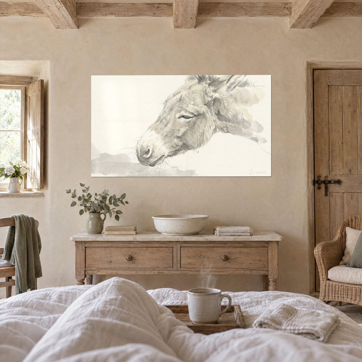 Wall art donkey profile with long ears, black ink lines on cream and beige background, light wood chest of drawers, above a bed in a bright bedroom