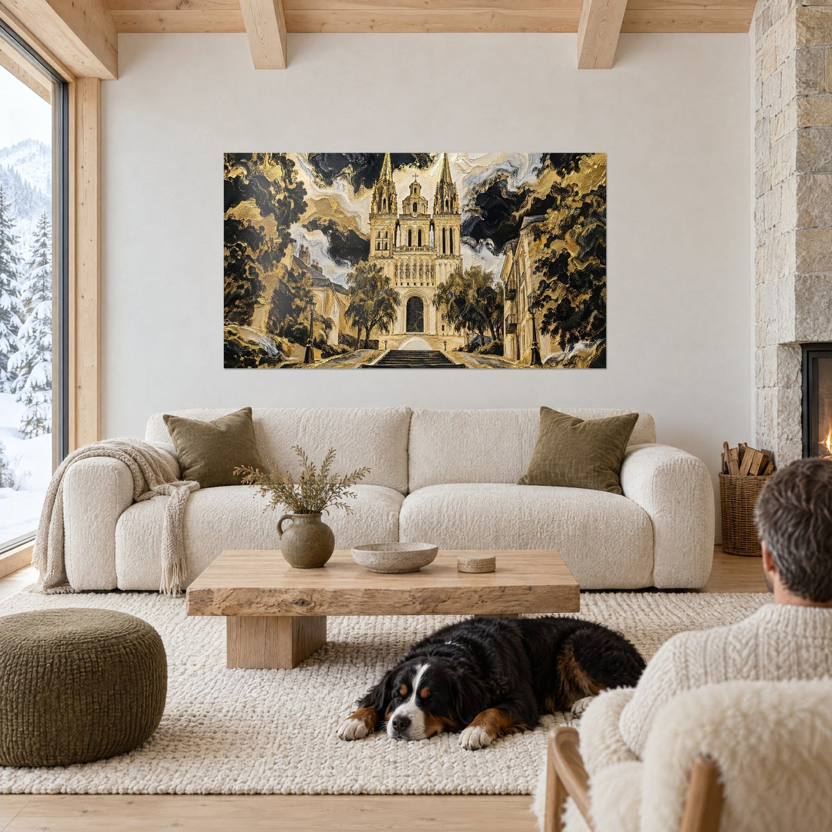 Wall art gothic facade with two gold spires under a swirling black and white sky, dog lying down, above a sofa in a bright living room