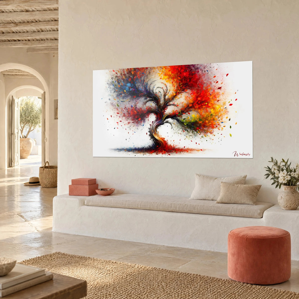 Wall art swirling oak splashed with red, yellow and blue on a white background, three-quarter view beside a light bench
