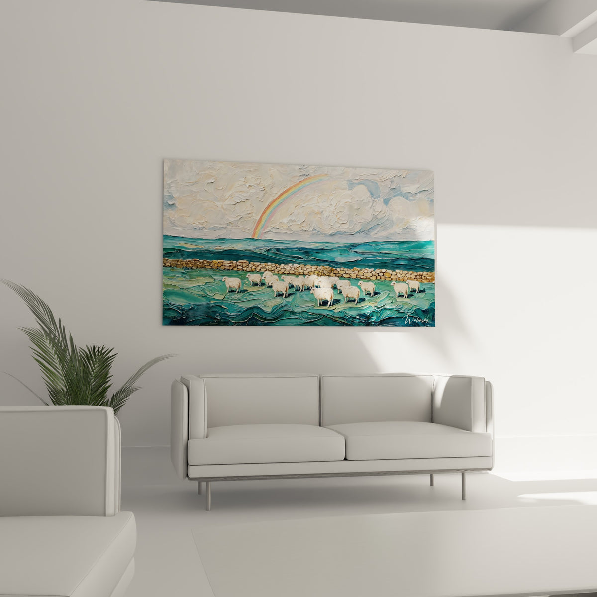 Prairie émeraude et arc-en-ciel corail accrochés au-dessus d'un canapé dans un salon lumineux