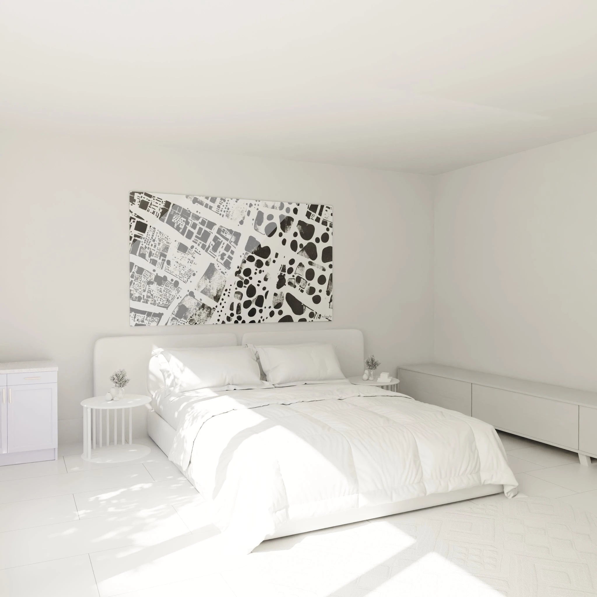 Tableau tacheté noir et blanc de Walensky dans une chambre minimaliste avec lit blanc