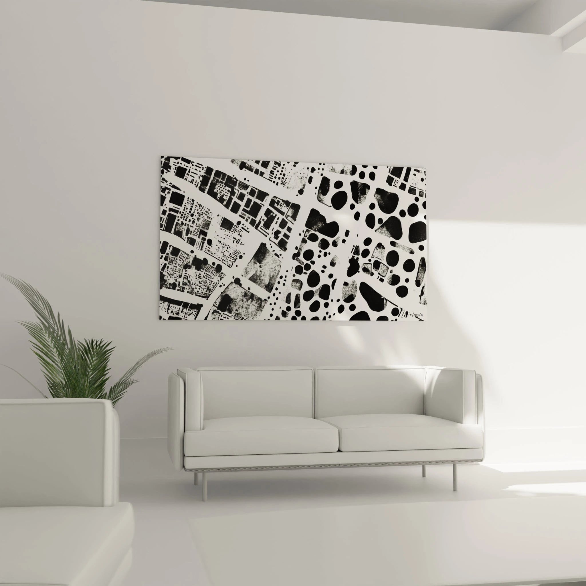 Tableau tacheté noir et blanc de Walensky accroché sur un mur de salon moderne