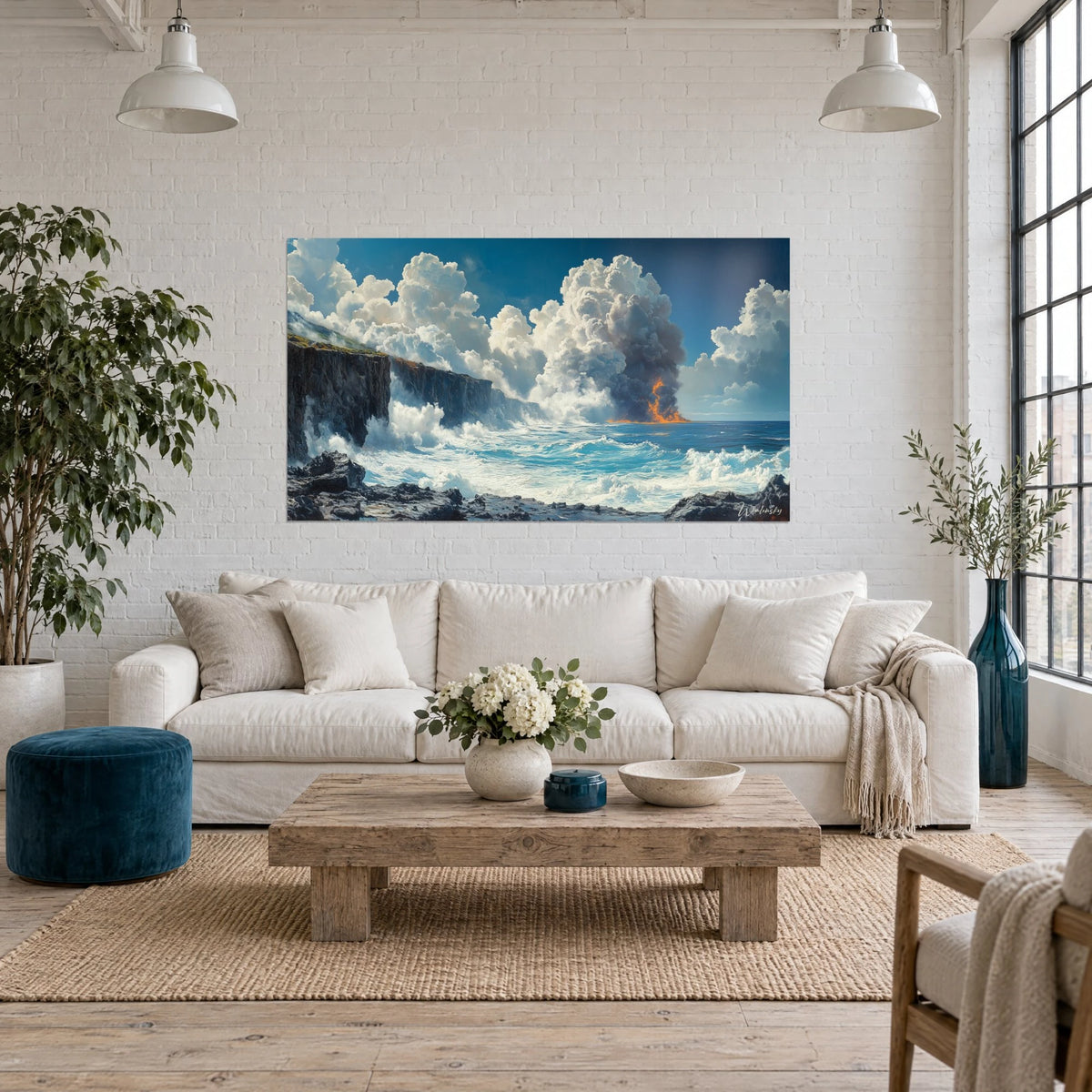 Wall art dark basalt cliff battered by turquoise waves, grey plume of smoke, above a sofa in a bright living room
