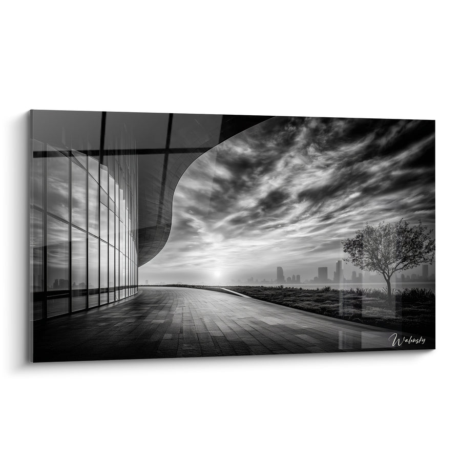 Tableau Bâtiment incurvé noir et blanc au soleil levant - Arbre solitaire et promenade - Edition Architecture abstrait