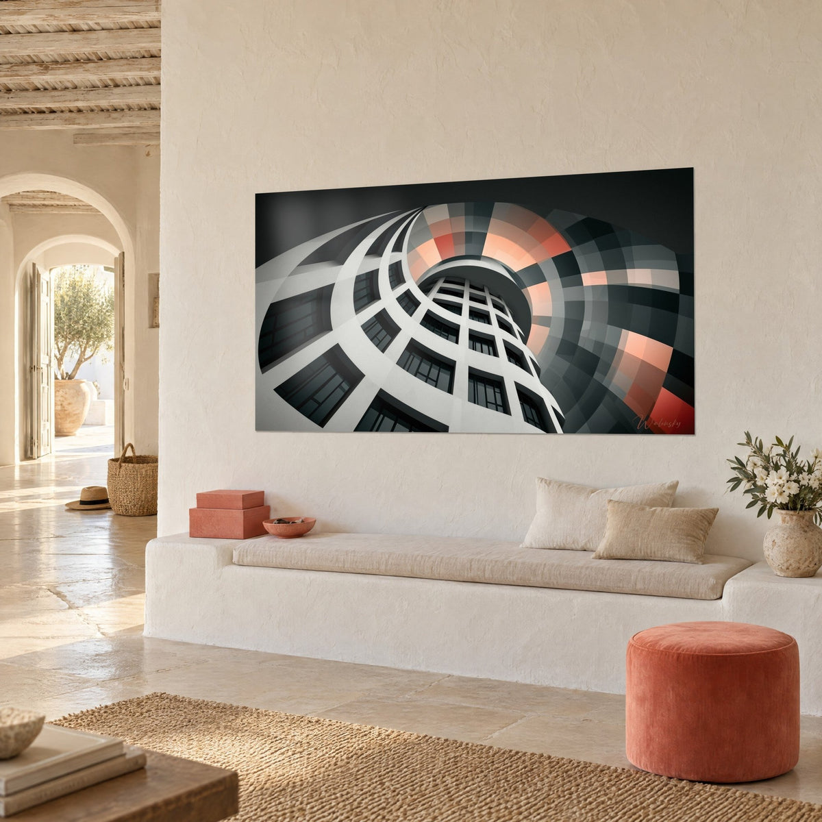 Tableau tour circulaire aux fenêtres sombres, mosaïque grise et saumon en tourbillon, accroché sur un mur blanc de maison méditerranéenne