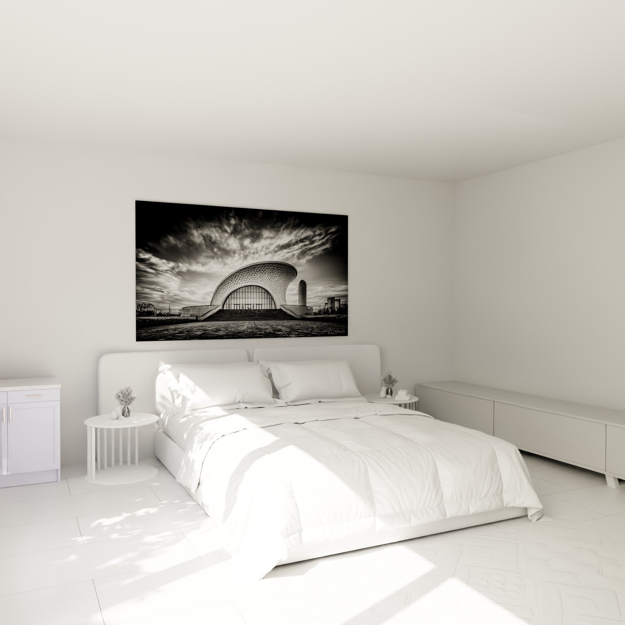 Édifice architectural blanc et gris au-dessus d'un lit dans une chambre claire et épurée