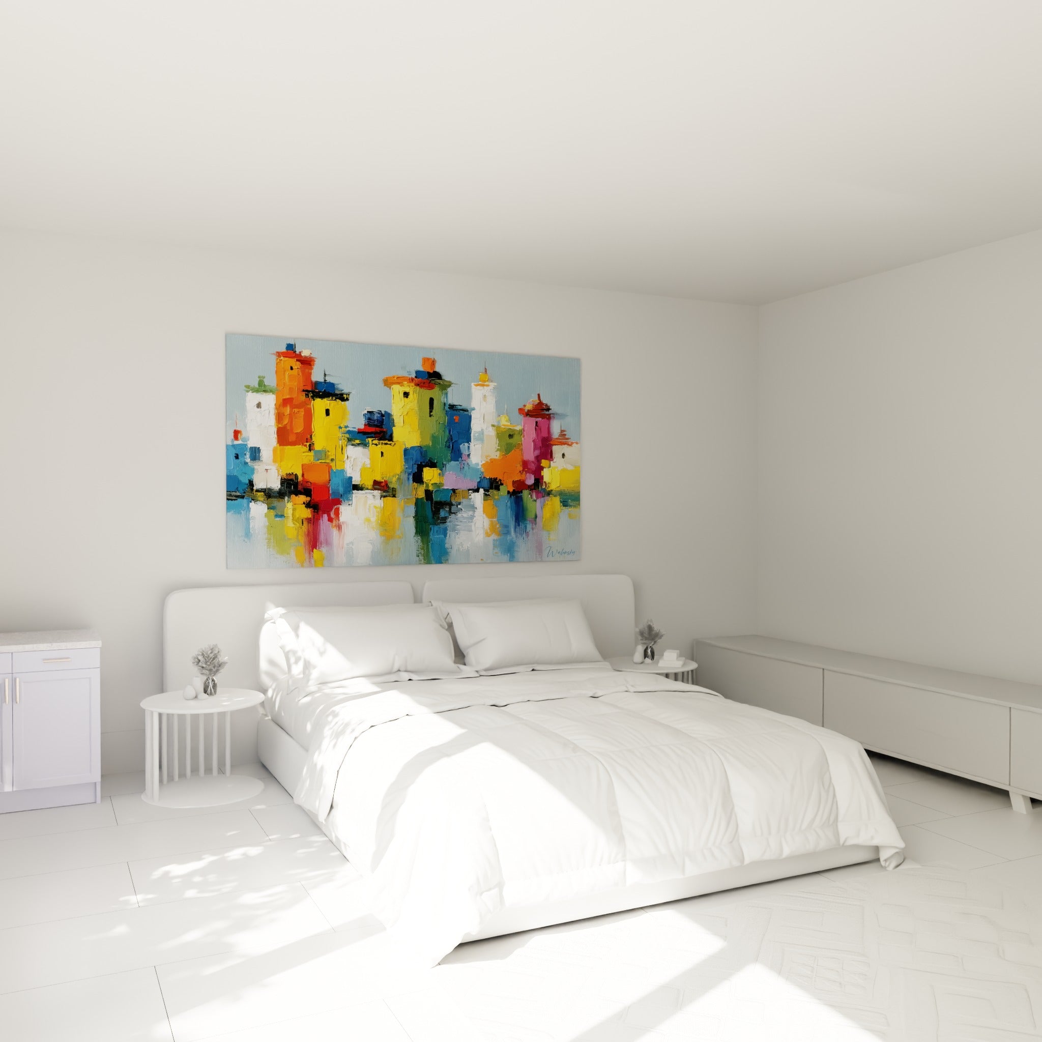 Bâtiments colorés jaune et rose peints au couteau, accrochés au-dessus d'un lit dans une chambre claire