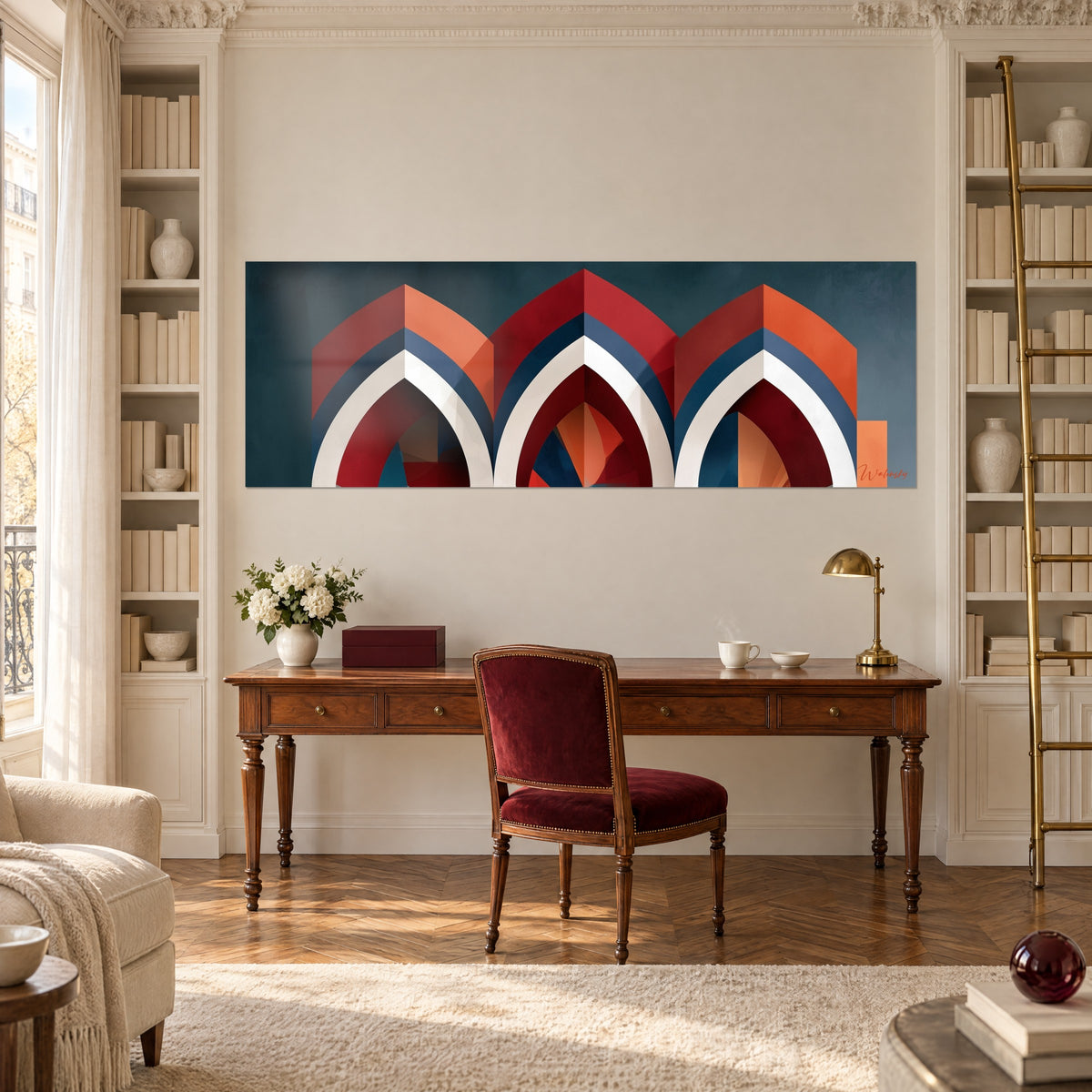 Tableau frise d'arcs pointus rouge et marine à facettes, accroché au-dessus d'un bureau en bois près d'une bibliothèque