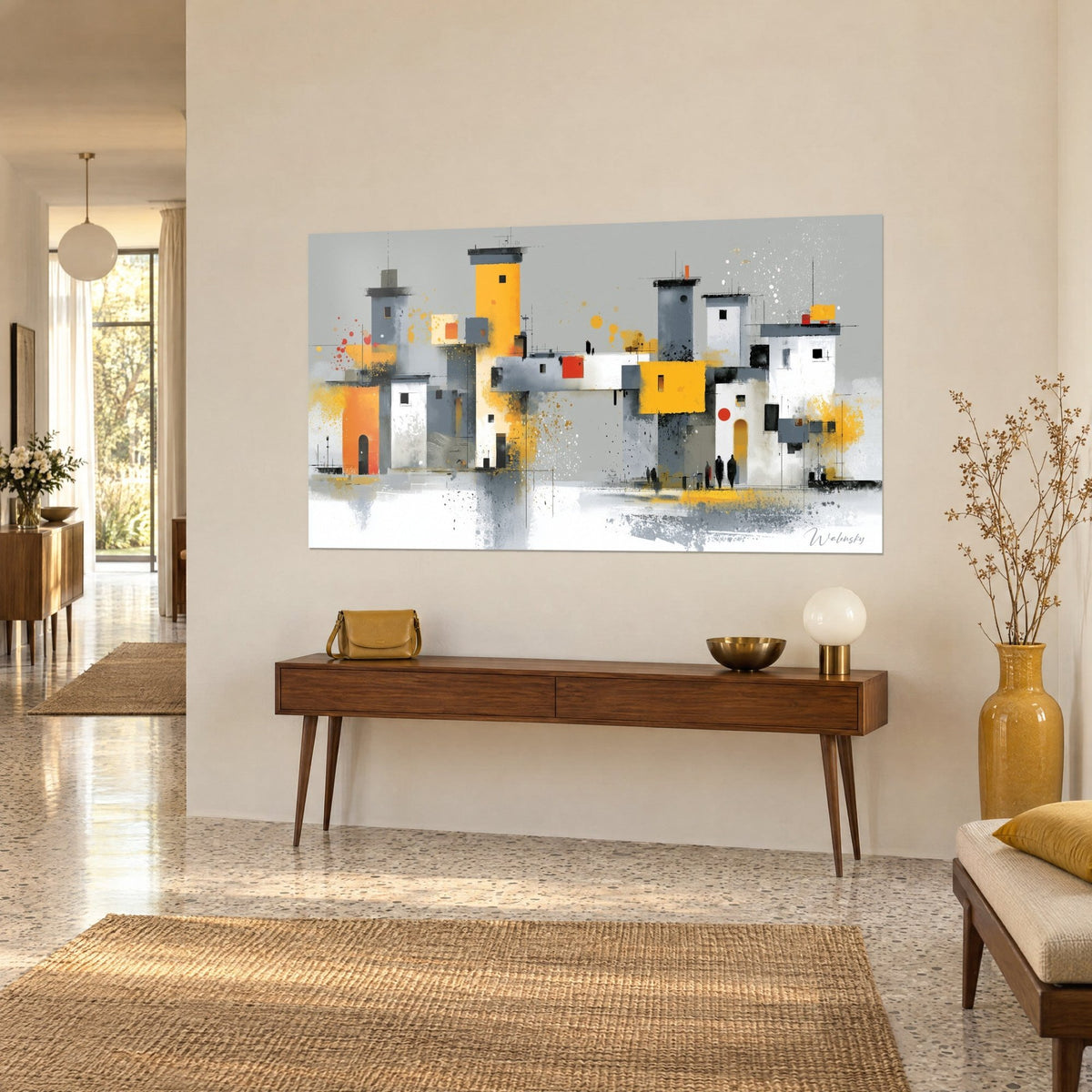 Tableau ville abstraite aux tours jaune moutarde et gris ardoise, plaque rouge vif, sur un buffet en bois, vue de trois-quarts
