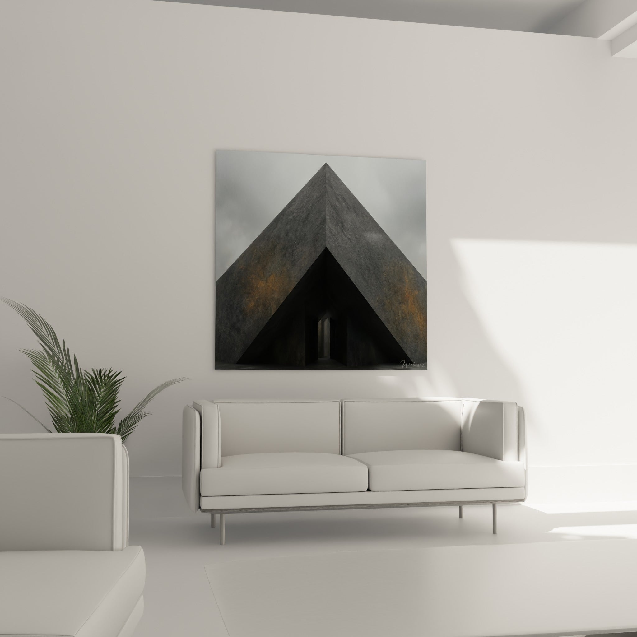 Formes triangulaires anthracite et ocre disposées au-dessus d'un canapé dans un salon lumineux