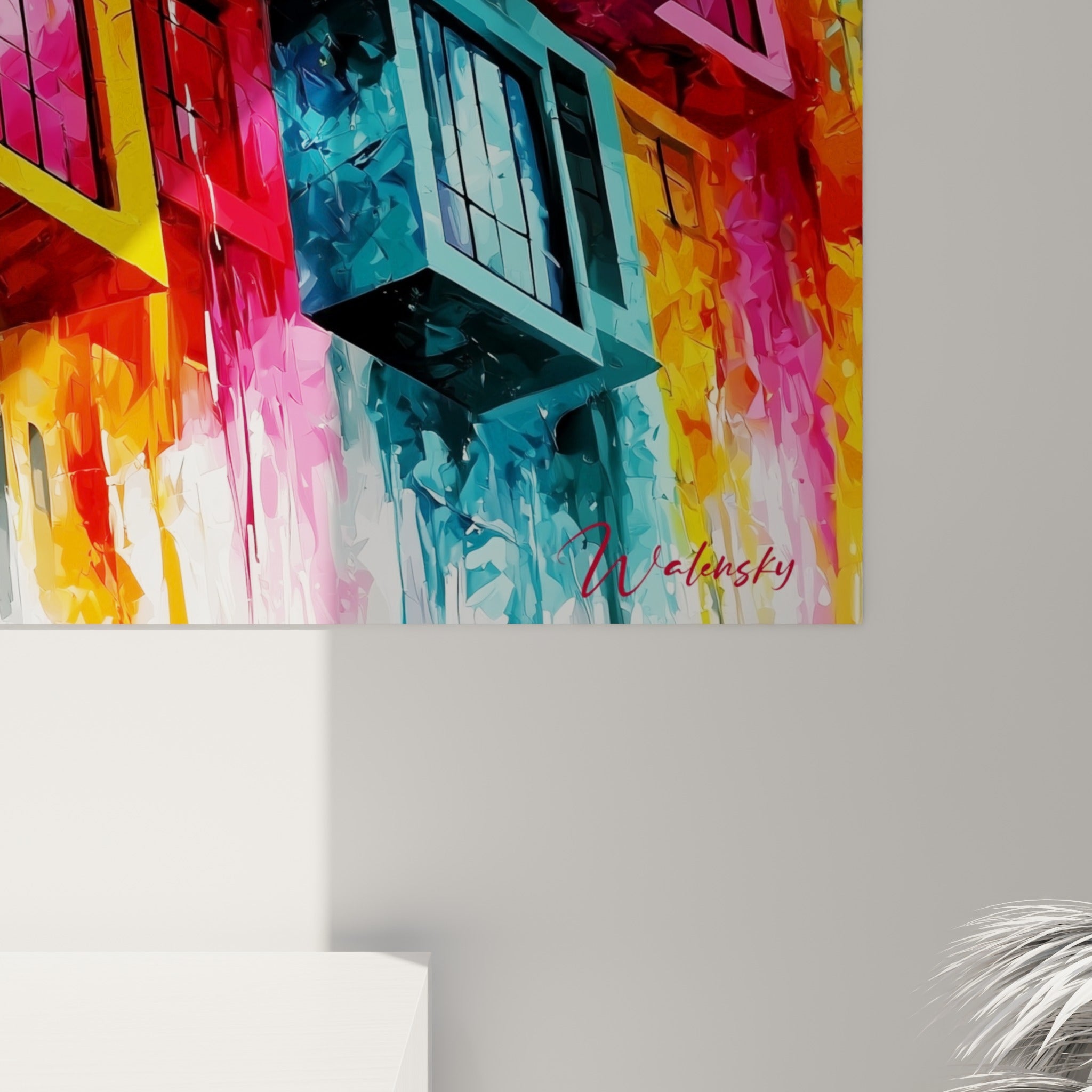 Empâtements et coulures turquoise, rouge et jaune visibles sur ce tableau d'architecture abstraite accroché