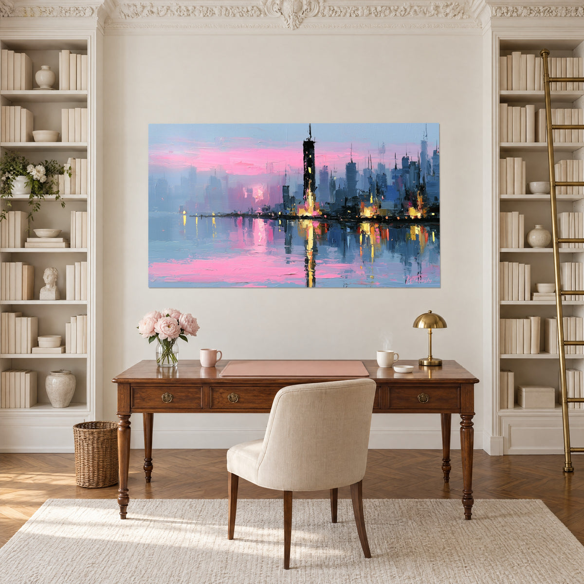 Wall art palette-knife metropolis, pink sky, blue-grey water and yellow glows, above a wooden desk between two bookcases