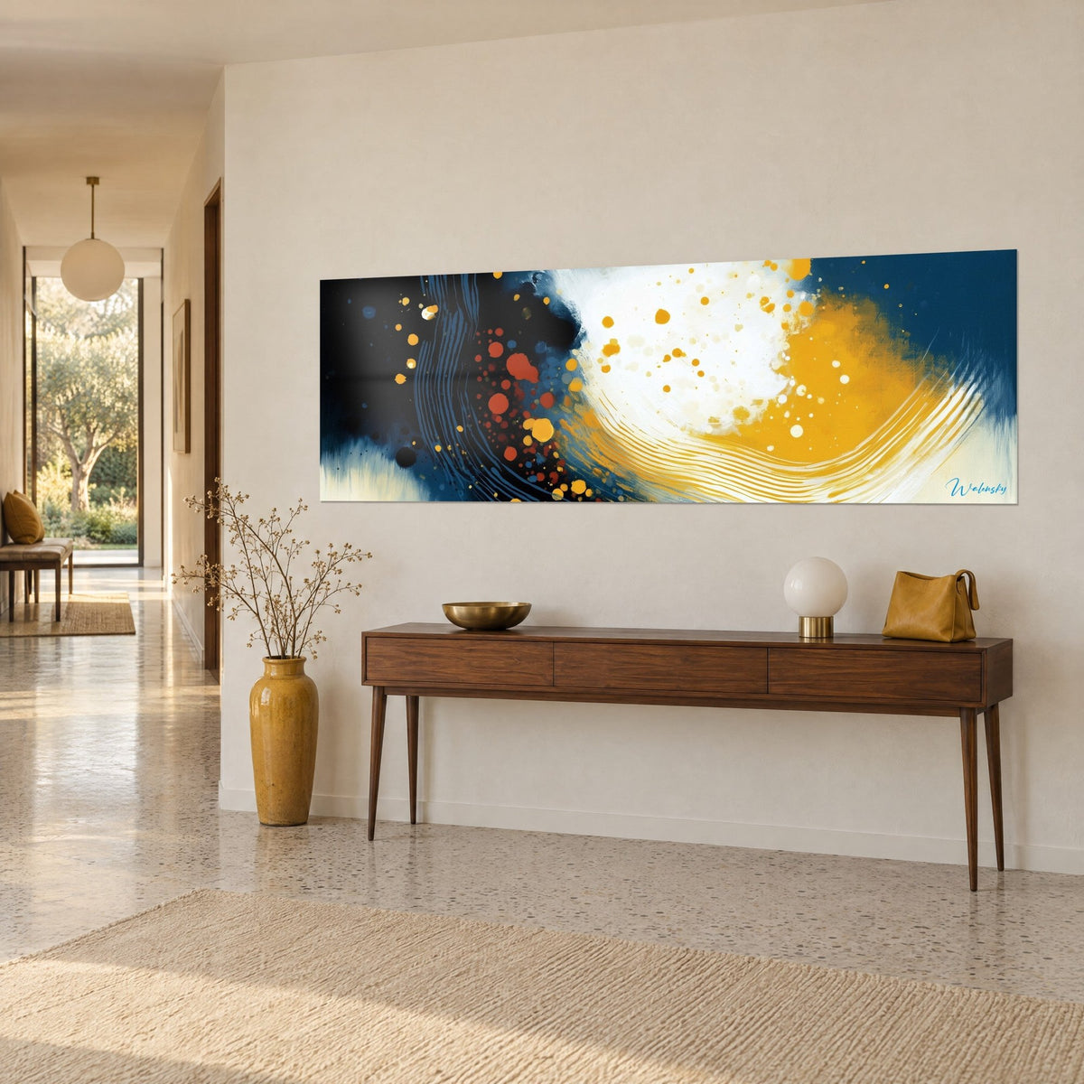 Wall art concentric ochre waves on a midnight blue background, cream-white cloud and orange dots, wooden console in the entryway