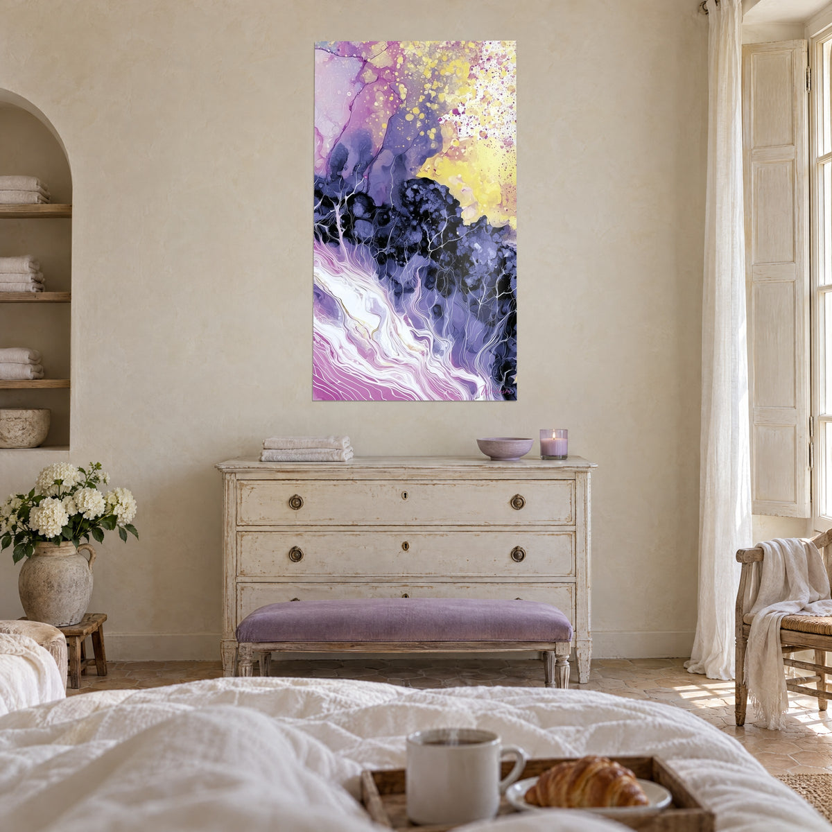 Wall art with orchid pink and pale yellow marbling, black shadow like white trees, above a bed in a bright bedroom