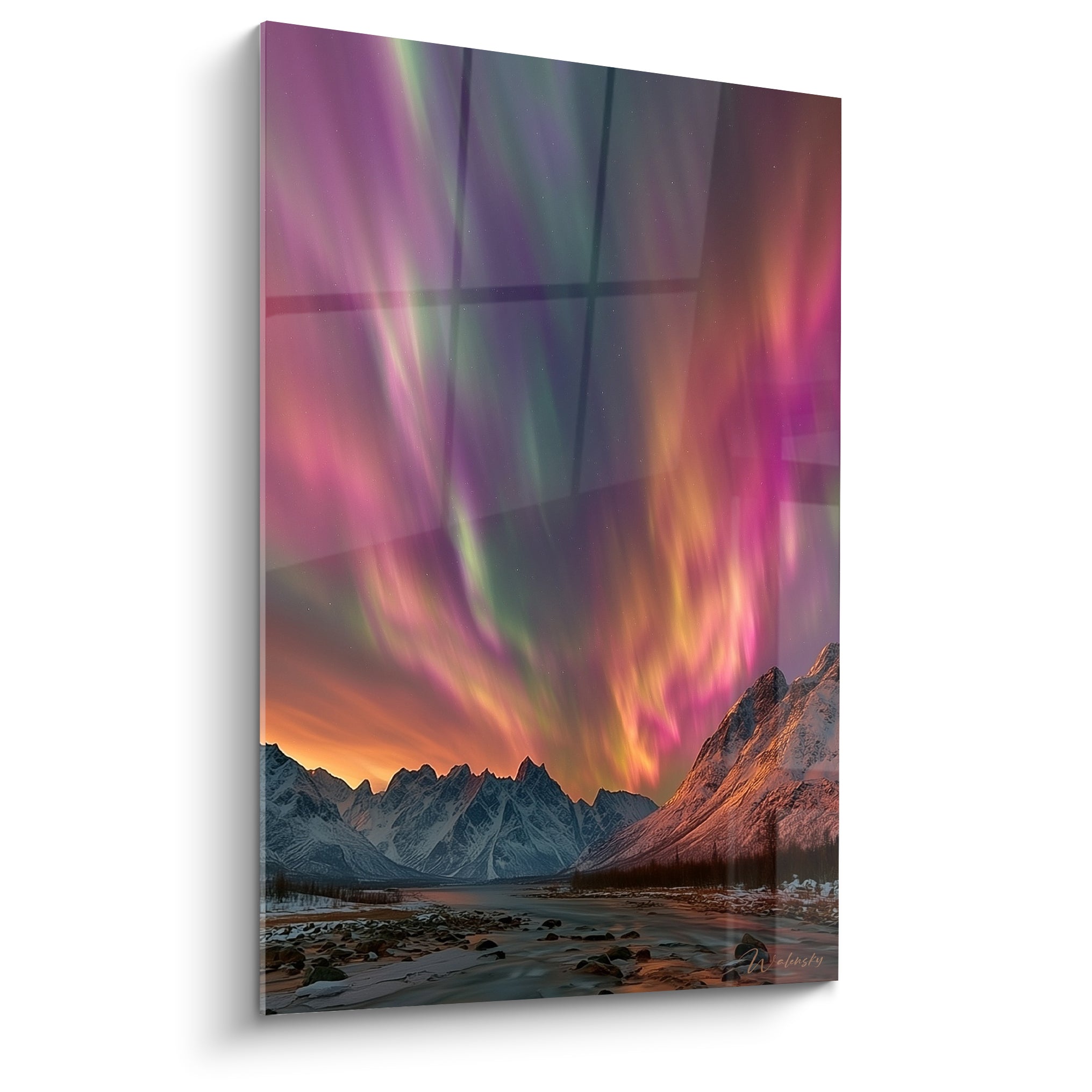 Aurore boréale rose et violette illuminant des montagnes enneigées sous ciel étoilé