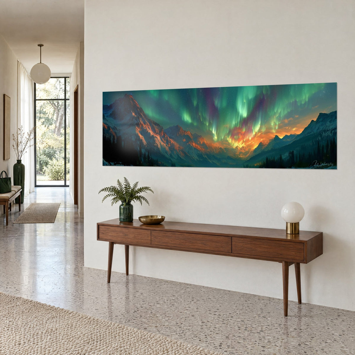 Tableau montagnes enneigées aux flancs rouille éclairés, voiles émeraude et pourpre dans le ciel, sur un mur beige, console en bois